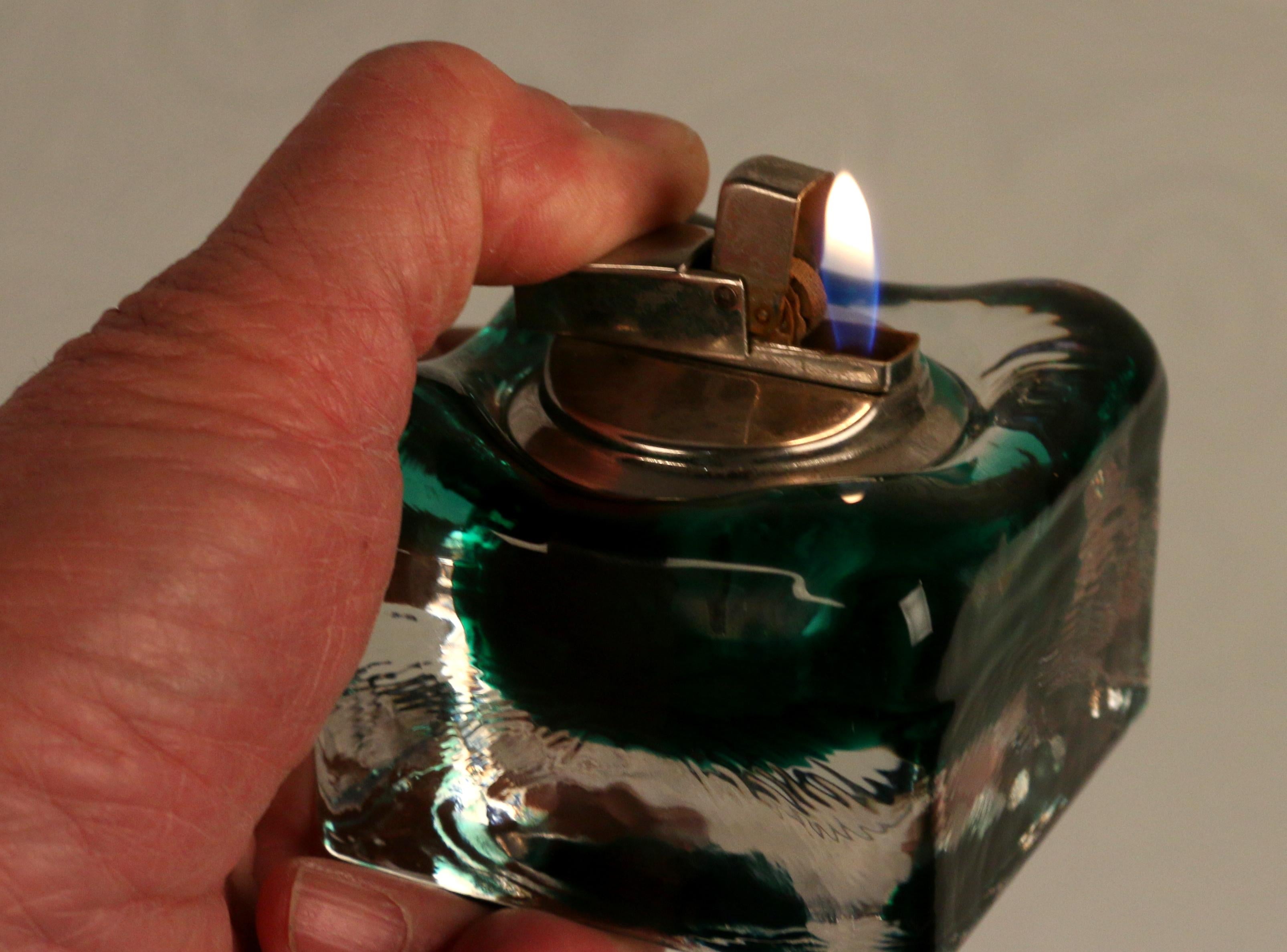 Mid-20th Century late 60s early 70s SET of a sommerso glass ashtray a candle holder and a lighter