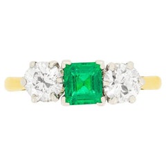 Late Art Deco 0.70ct Emerald and Diamond Three Stone Ring, C.1940s