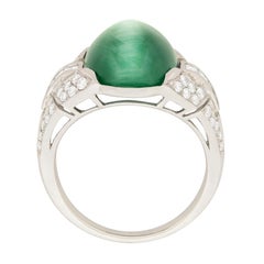 Late Art Deco 10.75 Carat Cat’s Eye Tourmaline and Diamond Ring, circa 1940s