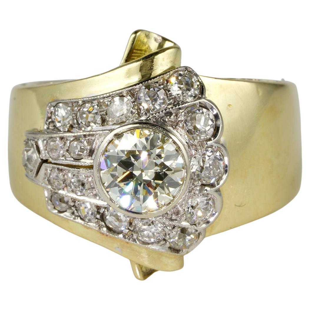 Late Art Deco 1.50 Ct Diamond Buckle ring 18 Kt Platinum For Sale