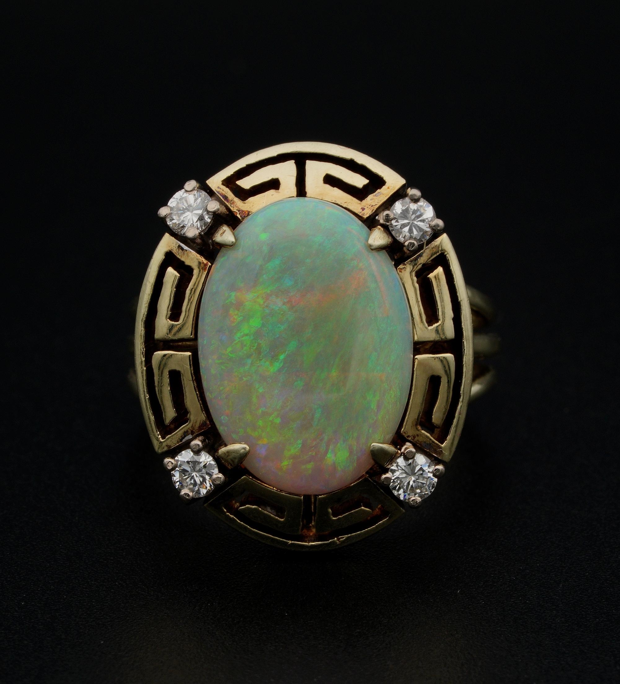 Universe in a Gemstone!

Magic, mesmerising gemstone is the Opal with rich colour play is like a window on the universe
This quite one off ring is a late Art Deco period 1935 ca hand crafted of solid 14 KT gold marked
It boasts beautiful workmanship