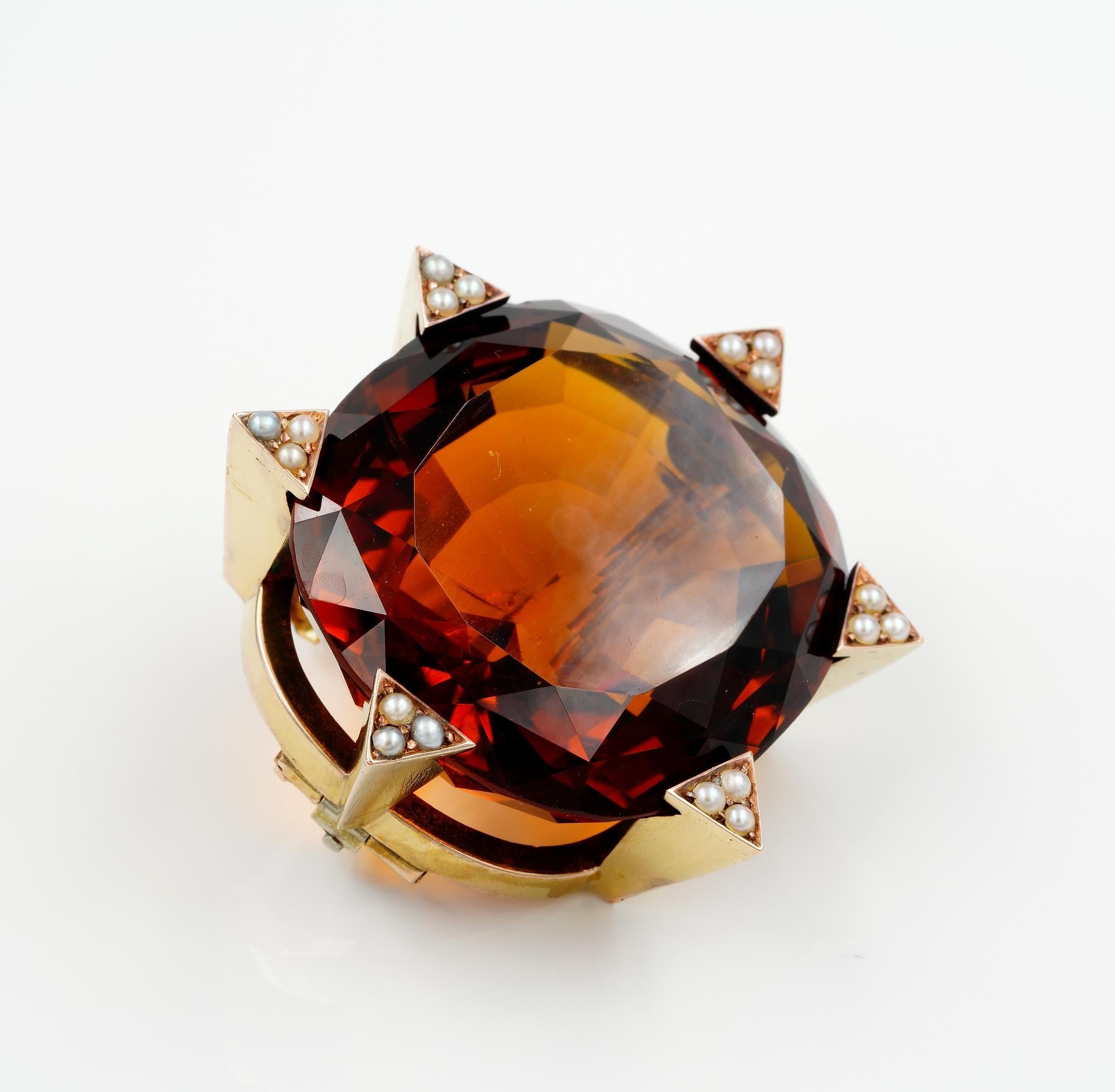 Tres Chic
This amazingly large 79.00 CT natural untreated Madeira Citrine of the most wonderful colour, large oval faceted cut, very rare when untreated
So chic and unique late Art Deco period, 1935 ca, mounted in a 18 KT mounting of geometric
