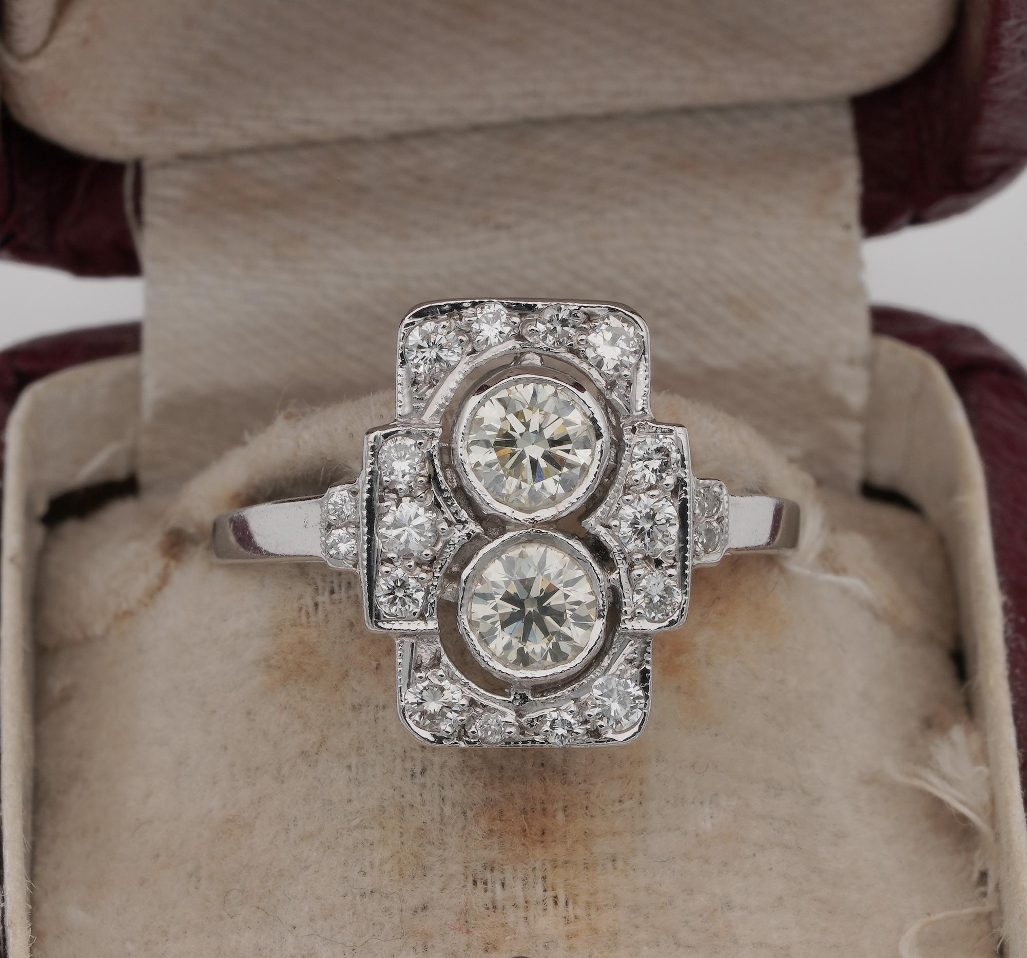 his is a very charming late Art Deco ring, in lovely rectangular crown starring a duo of Diamonds in the main panel with extra surrounding of Diamonds adding lots of power to the sparkling crown. Ring is 1935 ca, hand crafted of solid 18 KT white