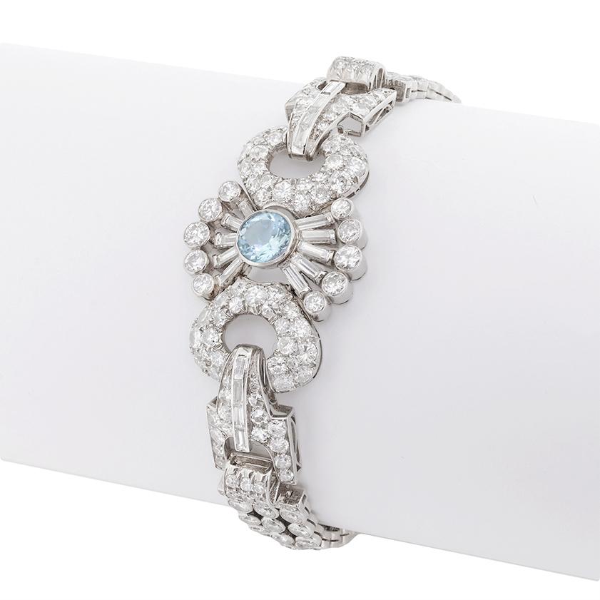 Set in 18 carat white gold, this stunning bracelet dates back to the 1940s and is all hand made. It has a combined weight of 11.50 carat in diamonds, which are a mix of baguette cut and round cut, transitional cut diamonds. They are all a stunning G