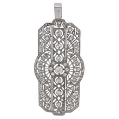 Late art deco diamond platinum pendant brooch