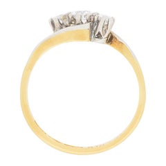 Late Art Deco Diamond Three-Stone Twist Ring, circa 1930s