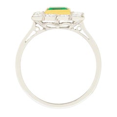 Late Art Deco Emerald and Diamond Cluster Ring, circa 1930s
