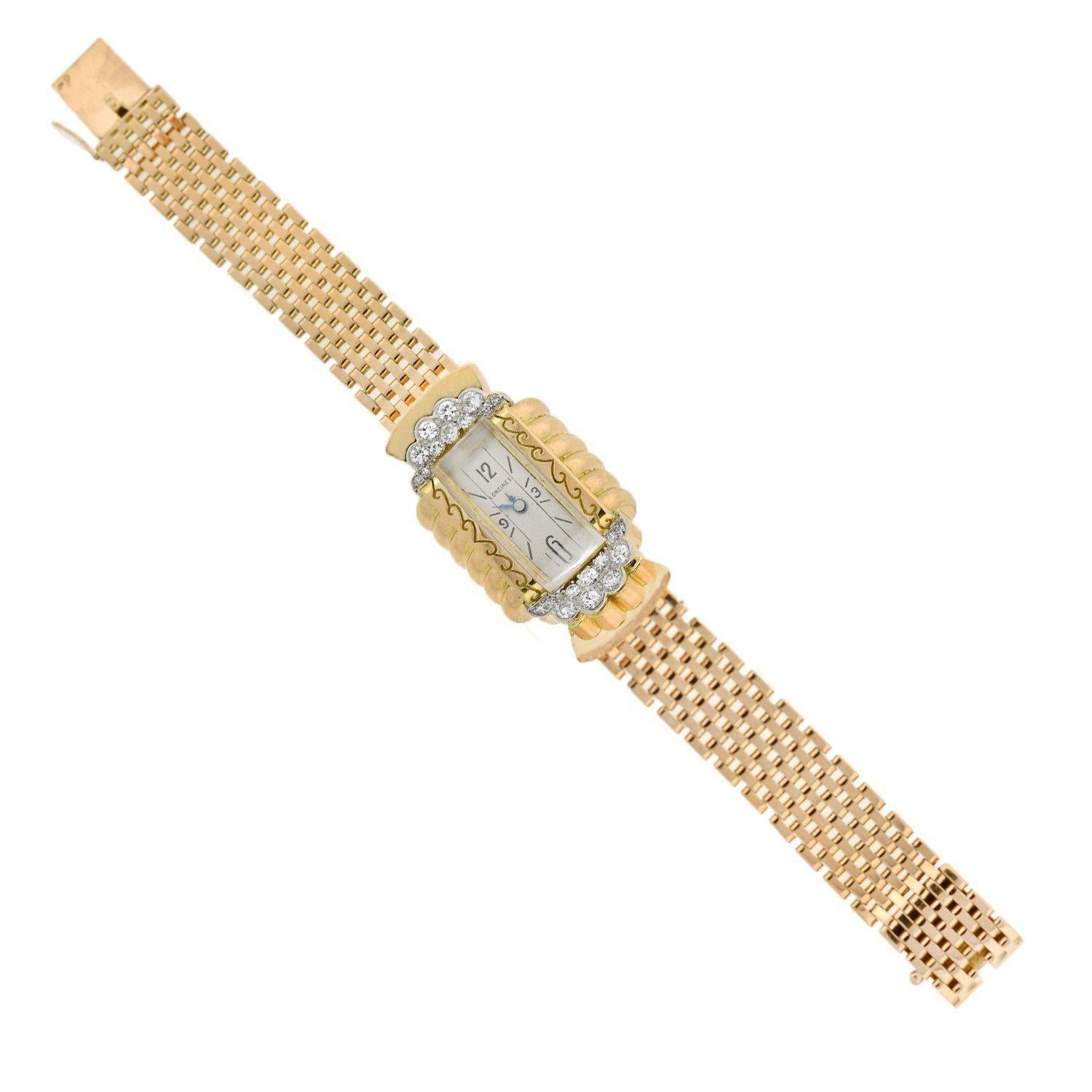 This stunning and unusual diamond watch from the late Art Deco (ca1930) era is an exceptional piece manufactured by the world renowned watch company, Longines! Crafted in vibrant 18kt yellow gold with platinum accents, this gorgeous ladies watch