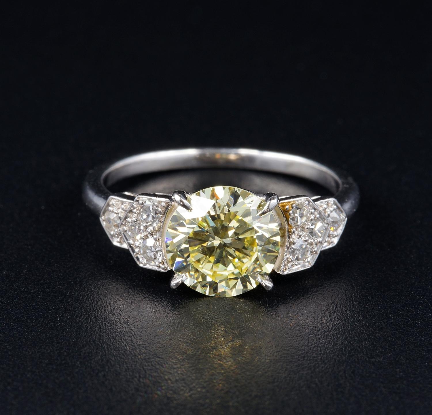 Late Art Deco one off French Diamond ring
This outstanding pool of light has been mounted on a for ever tasteful designed Platinum mounting with gorgeous Diamond motifs on sides
Rare and beautiful, stunning Brilliant cut Fancy Yellow Diamond of