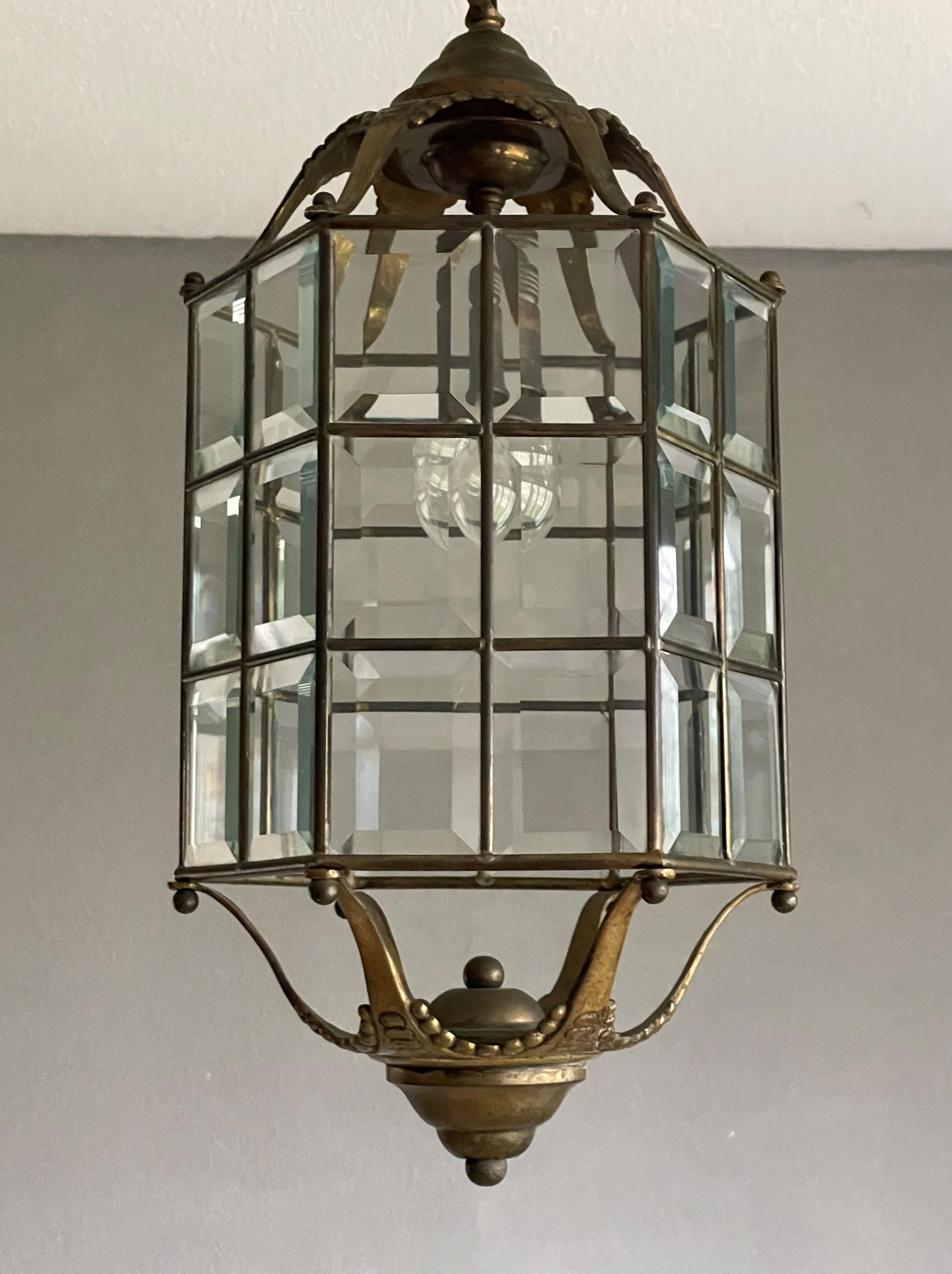 Good size and highly stylish antique entry hall lantern / pendant.

Having been specialised in selling antique light fixtures for over 20 years we love to keep finding amazing fixtures that we have never seen before. This marvelously hand-crafted