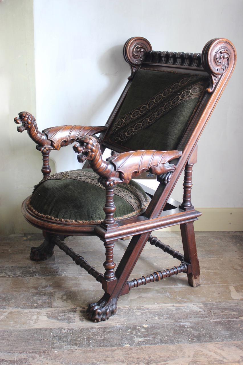 A rare , late 19th century carved walnut armchair attributed to the Catalan Joan Busquets ( 1872-1949) 
Please note the last picture where there is a pair of the same armchair with the original tapestry as well at 