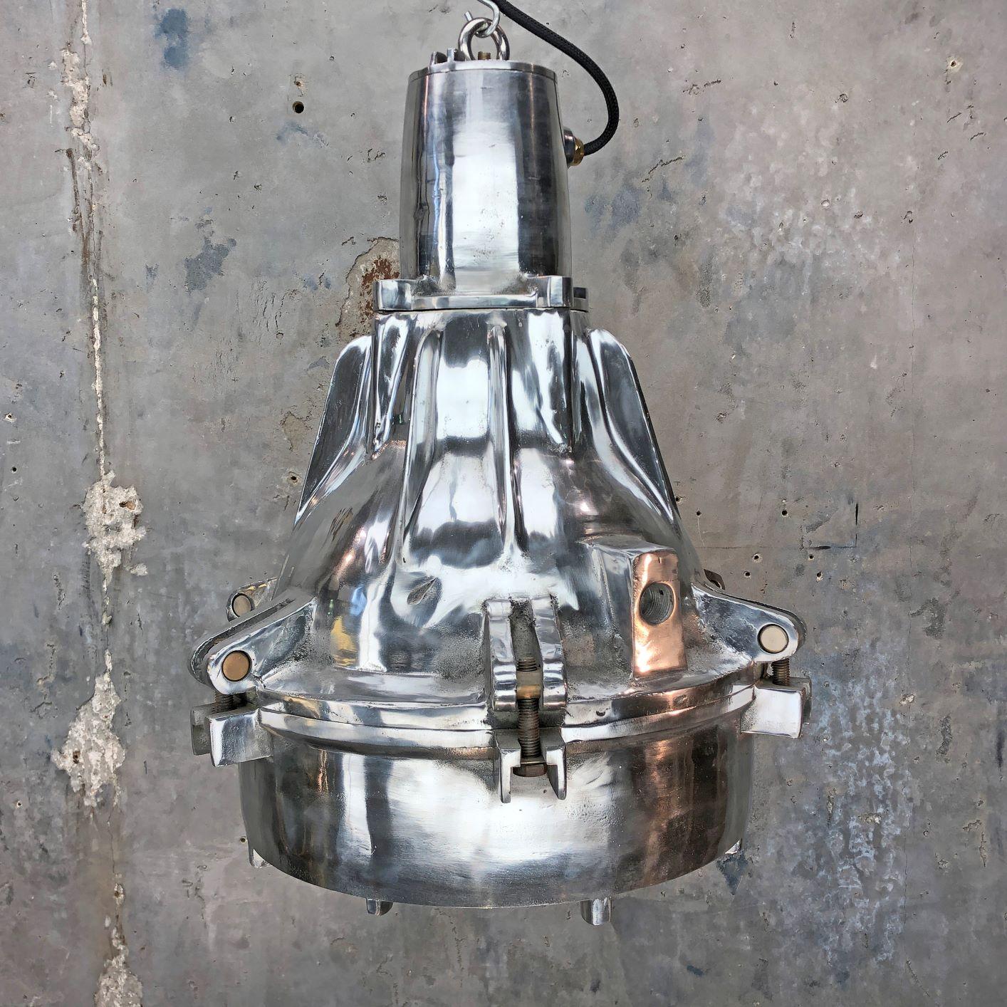 A large industrial aluminium explosion proof ceiling pendant. Reclaimed from cargo ships and professionally restored by Loomlight in the UK. Perfect for adding authentic industrial character to modern interiors. 

Fabricated using substantial cast