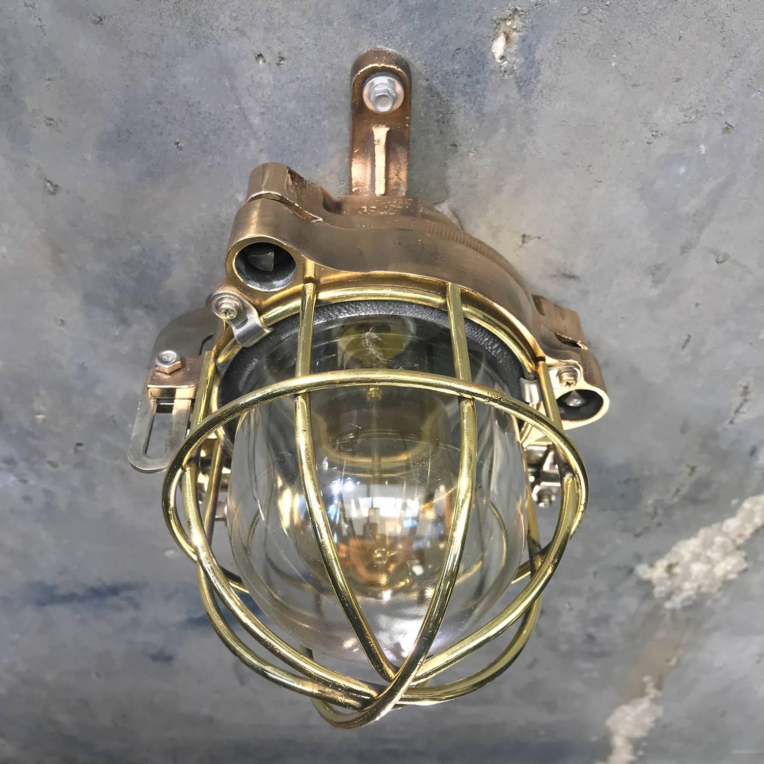 Industrial Late Century Flame Proof Cast Bronze Ceiling / Wall Light, Glass Dome Brass Cage For Sale