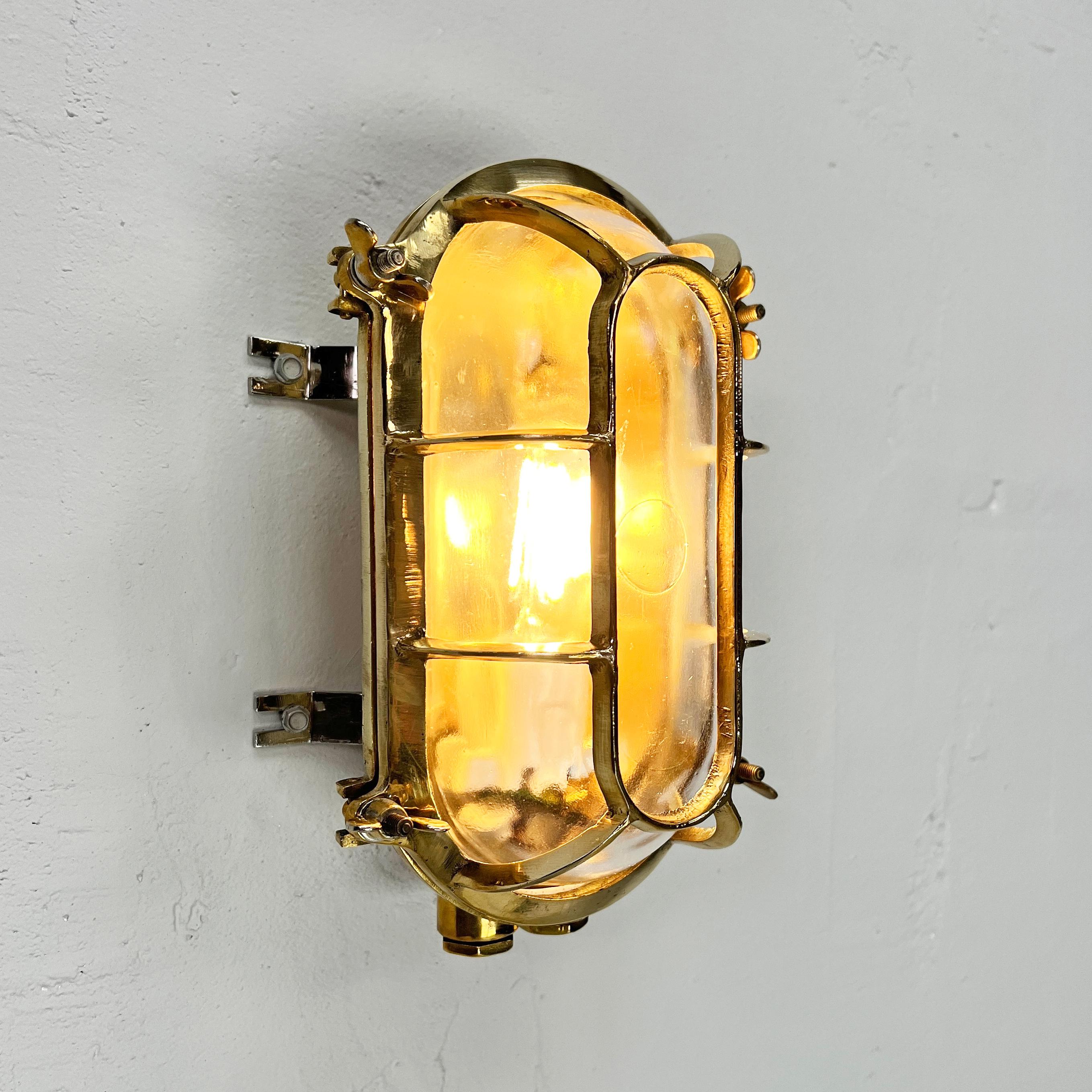 Late 20th Century Late Century German Brass Oval Wall Sconce with Oval Cage & Glass Shade  For Sale