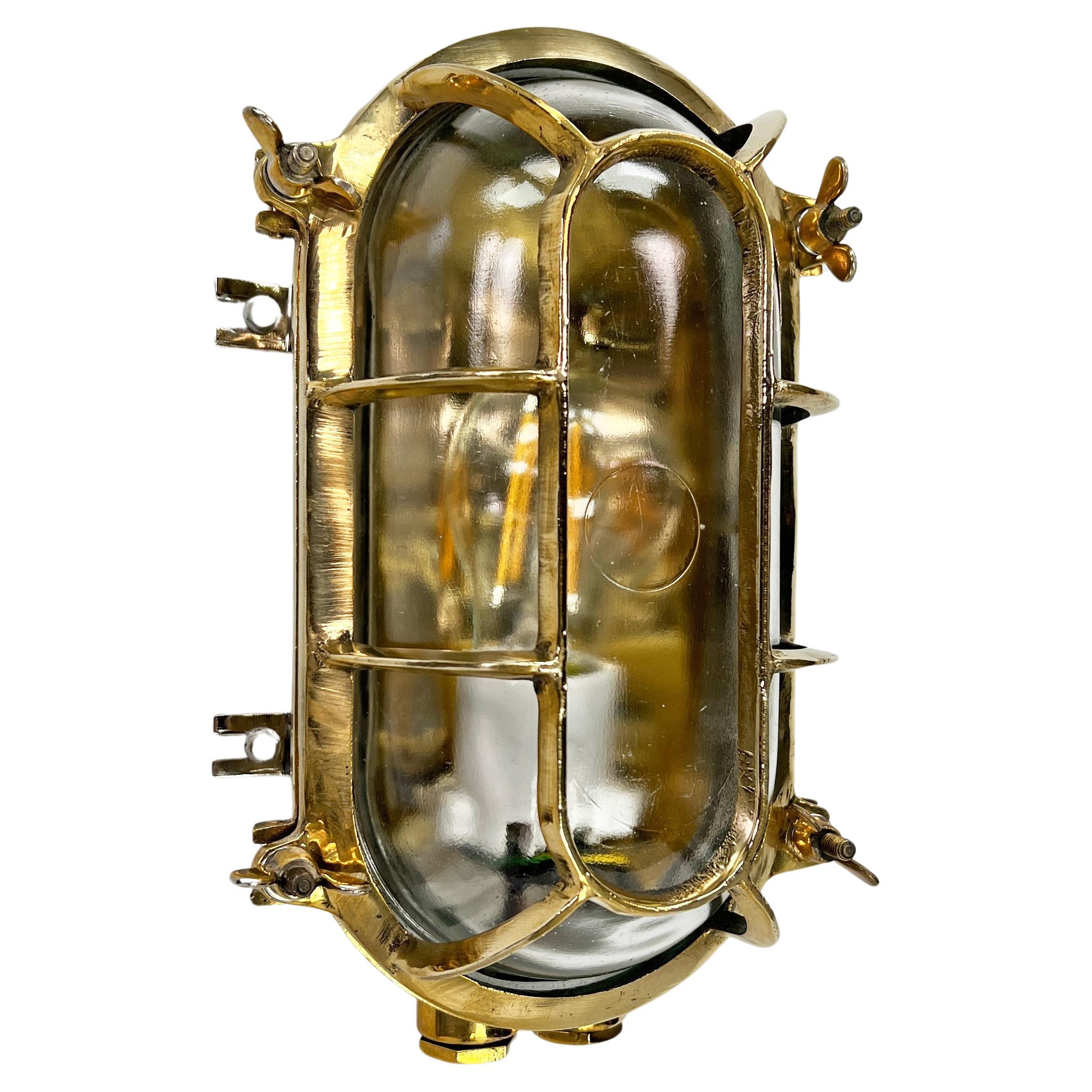 Late Century German Brass Oval Wall Sconce with Oval Cage & Glass Shade 