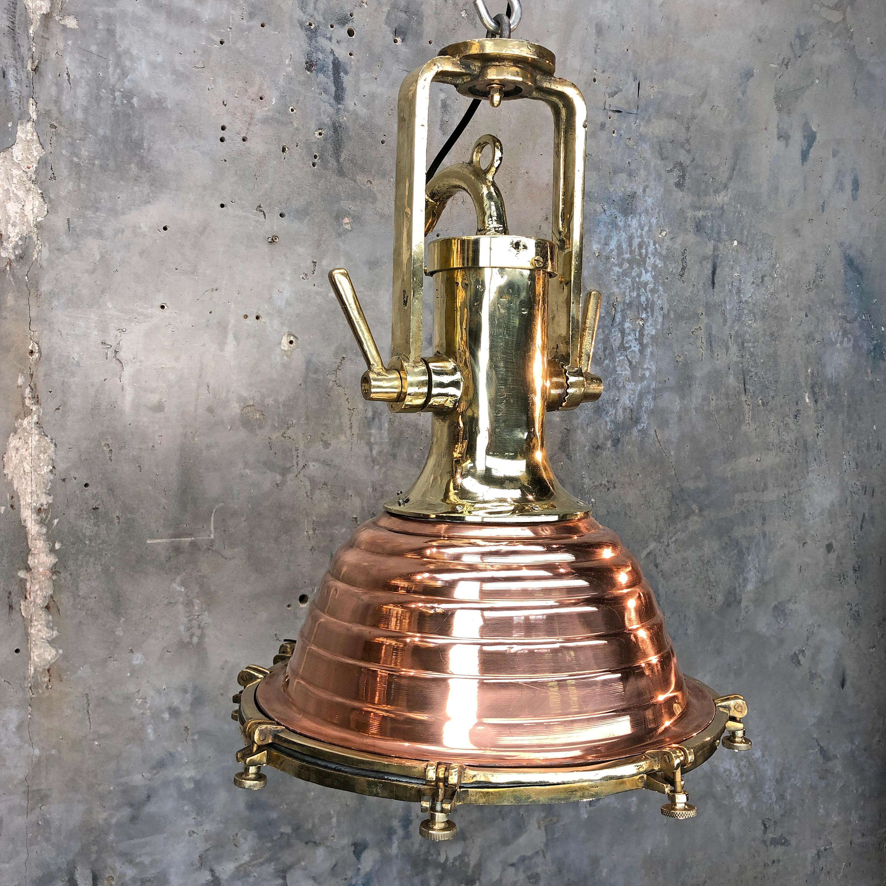 A reclaimed 1970s vintage industrial large copper and brass German cargo pendant.

Made by Wiska, a German manufacturer of industrial fixtures and fittings. Reclaimed from supertankers and professionally restored in the UK ready for use in modern