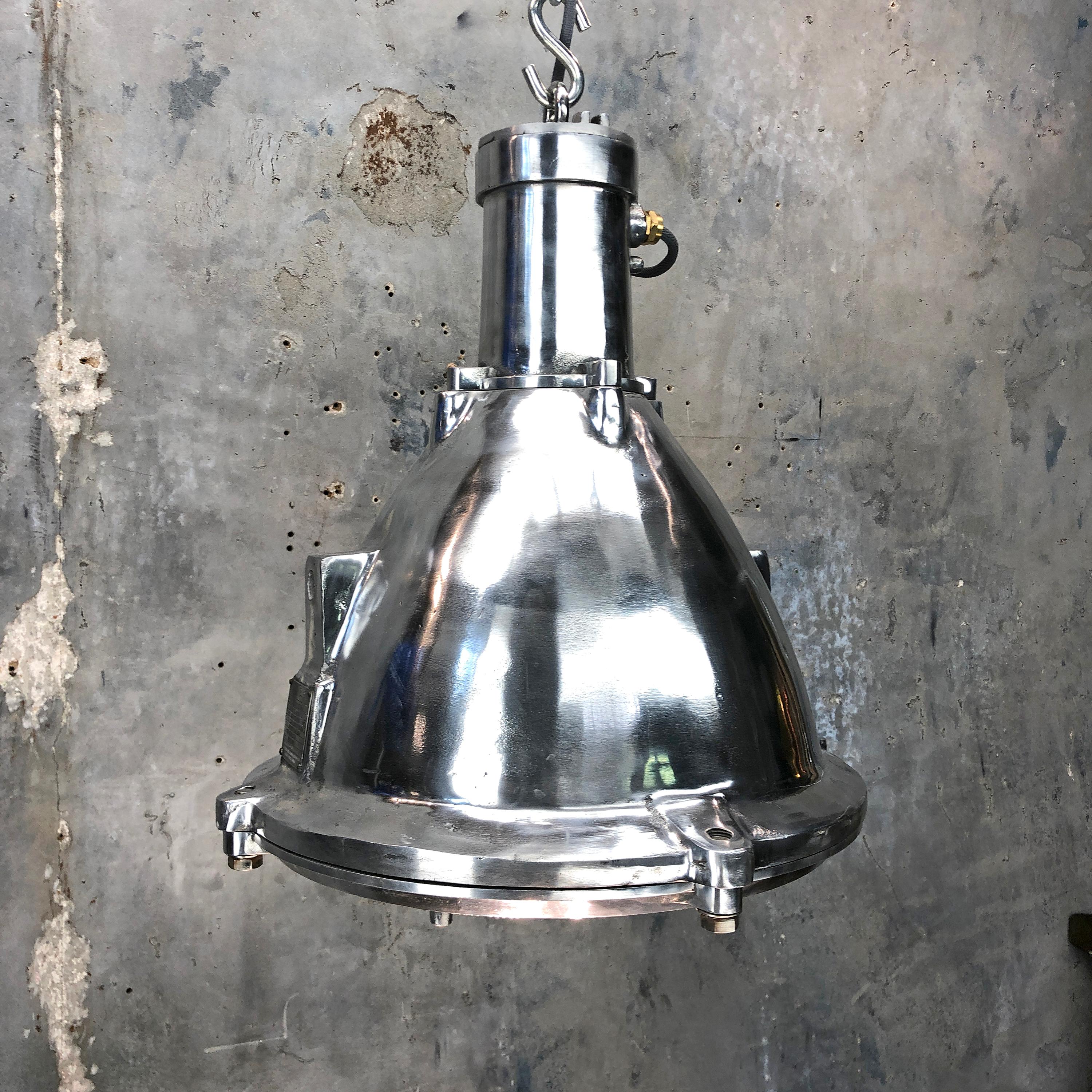 This is an original marine cargo pendant light made by Baliga of India.

Made from cast aluminum which has been stripped and polished this lights boasts great build quality and an IP65 rating which allows the fixture to be used in wet