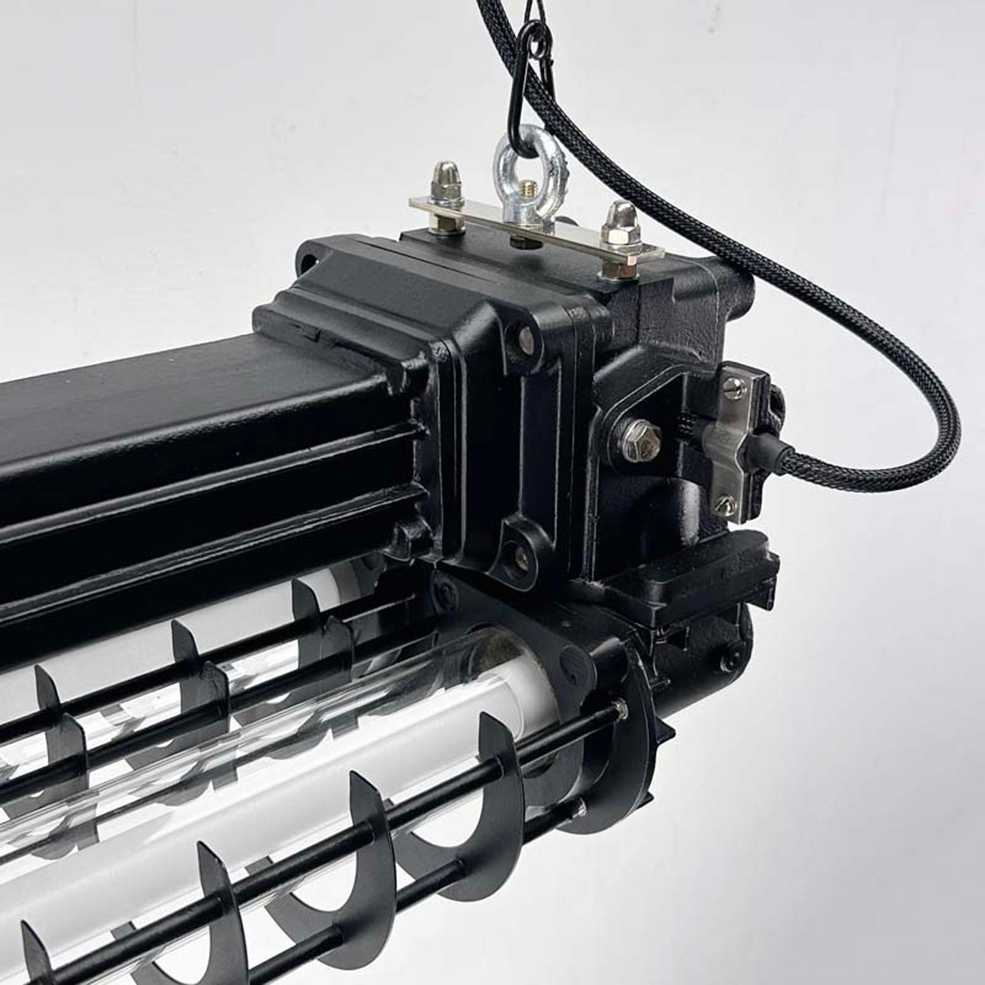Late Century Industrial Flameproof Tube Light with Cage - Black & Brass finish For Sale 1