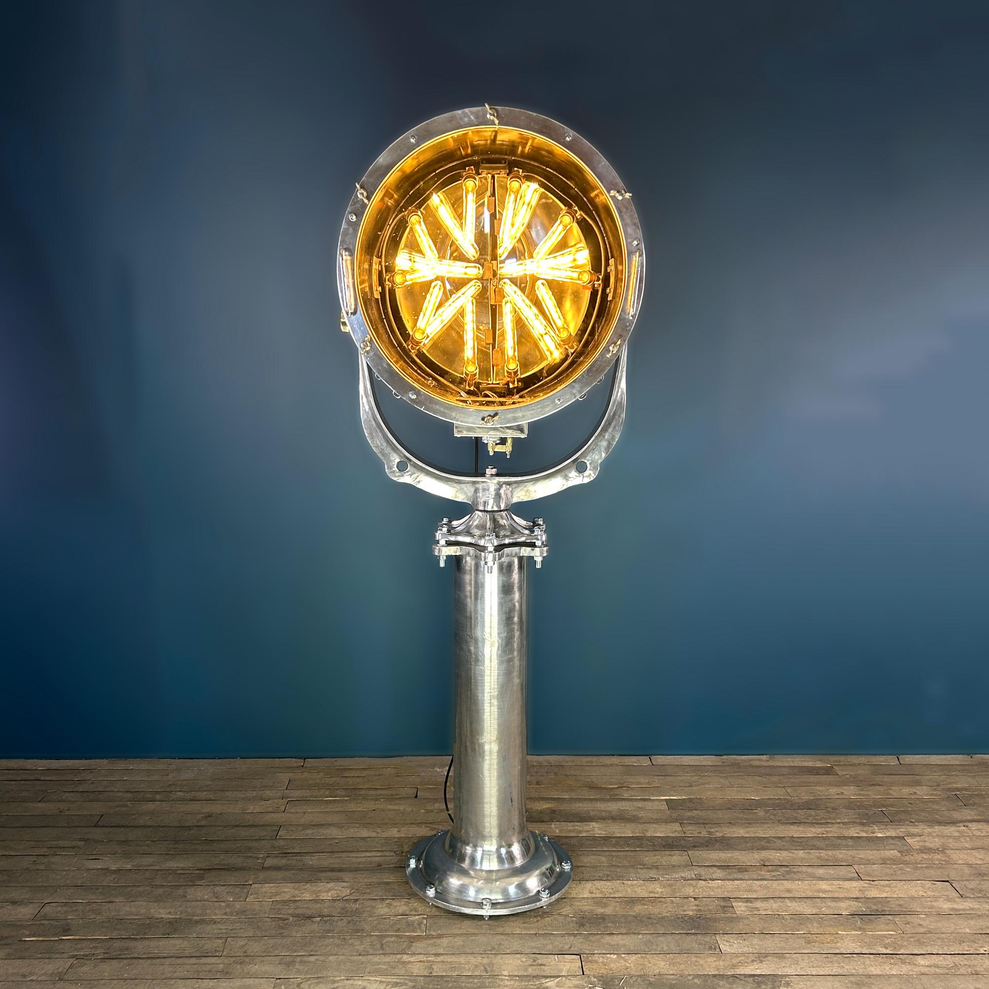 This is a bespoke Suez Canal searchlight floor lamp which we have fitted with a bespoke Edison LED filament tube arrangement. The bespoke lamp arrangement comprises 10 Edison LED filament 30cm tubes which can be changed easily. Access to the lamps