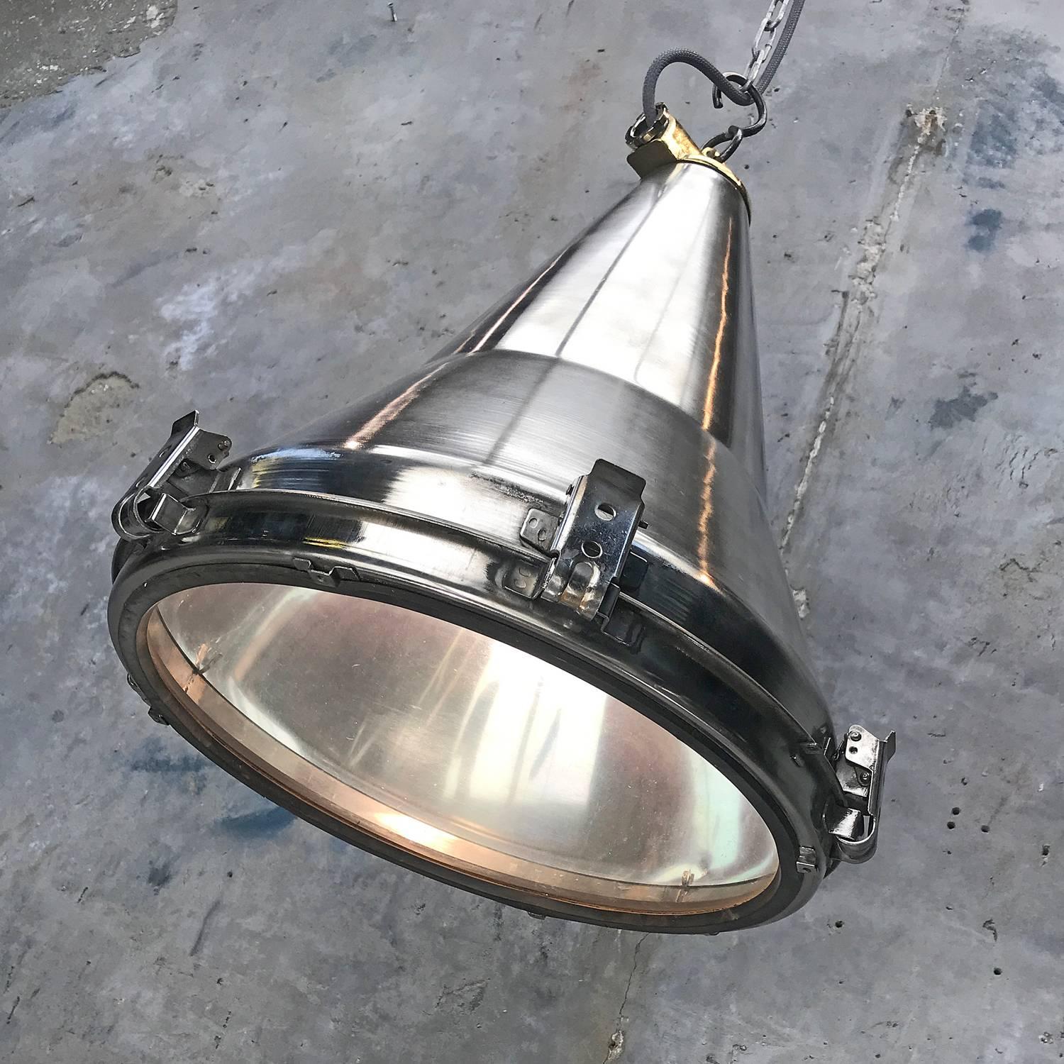 This light was one of many salvaged from cargo ships made in Korea circa 1980 and is very well designed and constructed.

They were originally used on masts and gantries of cargo ships and super tankers to flood light the container deck.

The