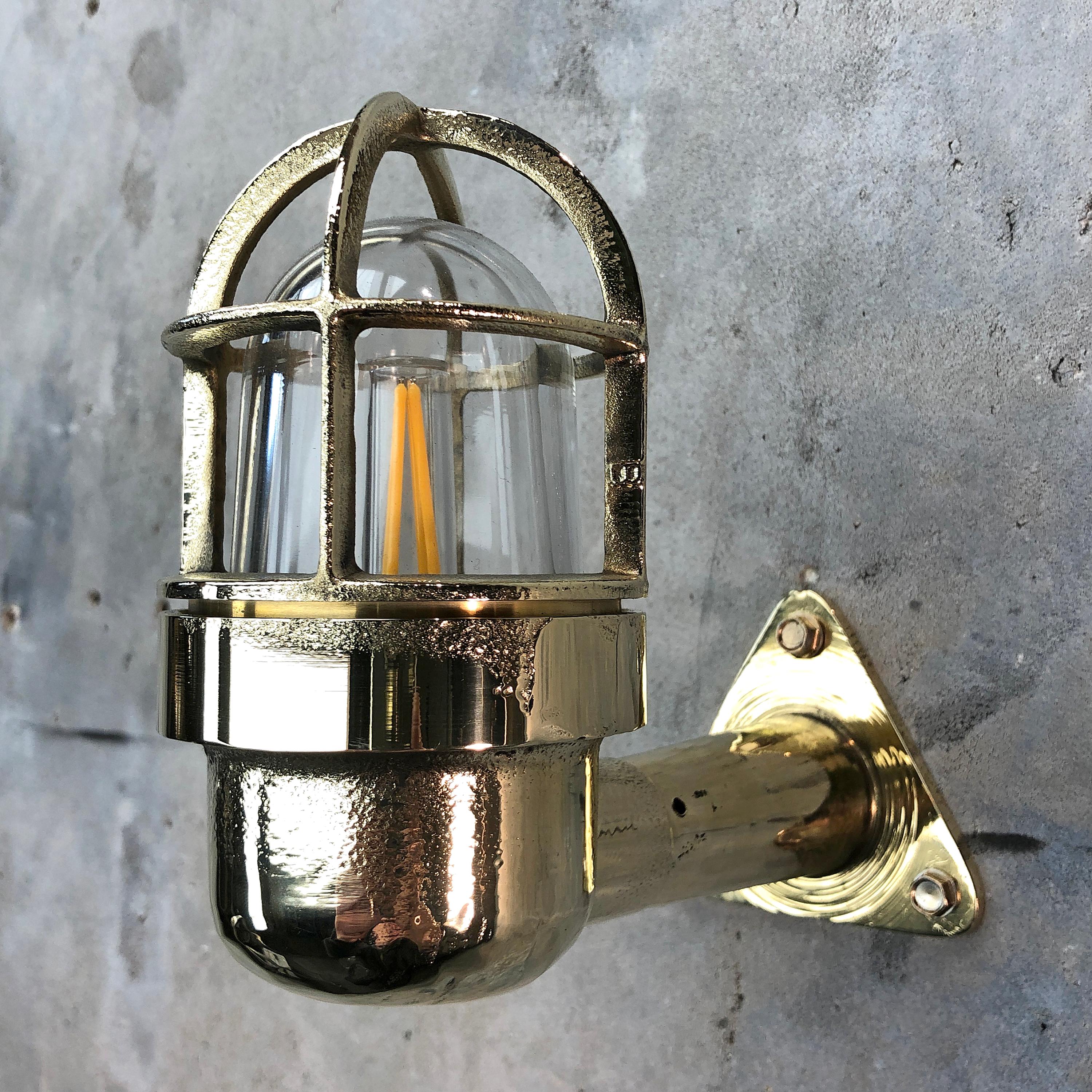 Compact solid brass cast90 degree wall light.

Made by Wiska - manufacturer of marine grade fixtures and components.

These lights were salvaged from cargo ships and supertankers made during the 1970s.

These are versatile fixtures ideal for