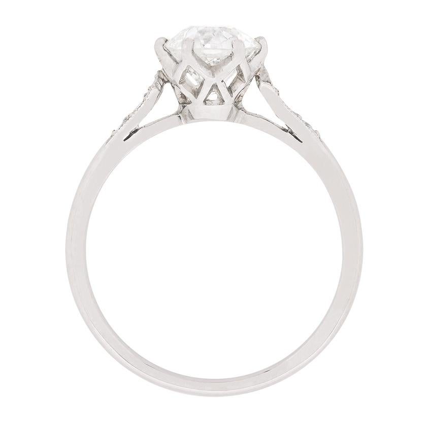 Dating to the 1930s, this solitaire engagement ring features a 1.12 carat old cut diamond as the main attraction. It has been certified by EDR (European Diamond Reporting) as a G in colour and VVS2 in clarity, which is top quality. It is within a