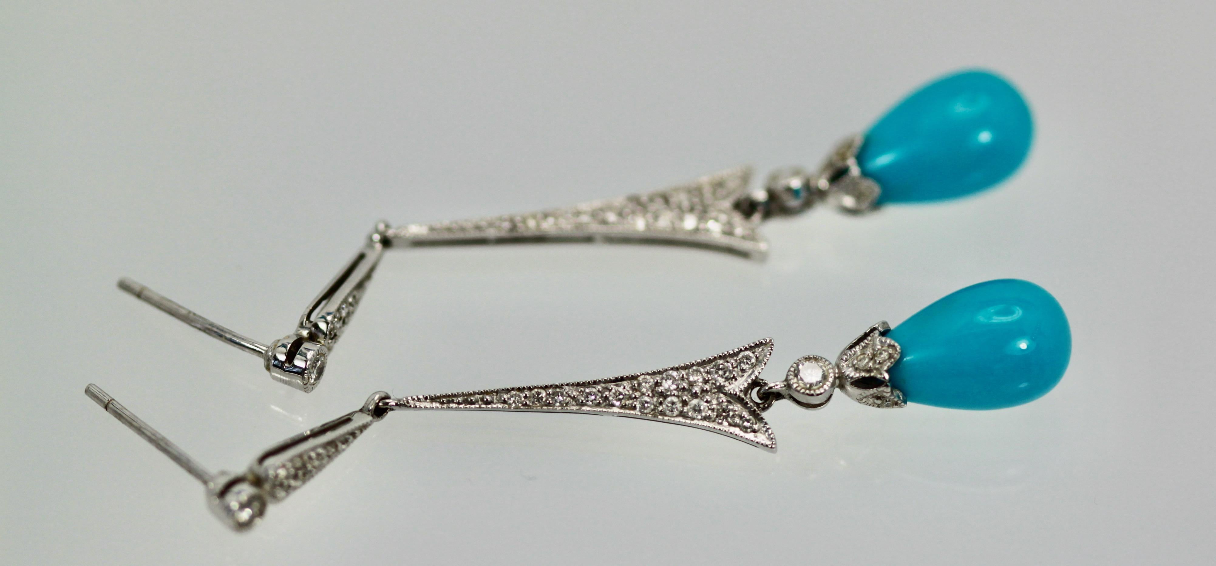 These 18K Diamond Turquoise lovely drop earrings are from the late Deco period around 1930's.  The turquoise is a true Persian blue with the Diamonds giving it a nice finish. They are 55cm long, the Turquoise is 9 cm long and weighs 8 grams. Simple