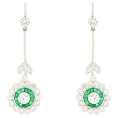 Boucles d'oreilles à cible en diamant et émeraude, A.I.C., c.1940.