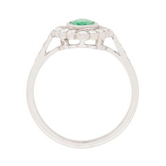 Late Deco Emerald and Diamond Cluster Ring, circa 1940s