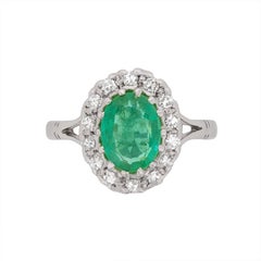 Vintage Late Deco Emerald and Diamond Cluster Ring, circa 1930s