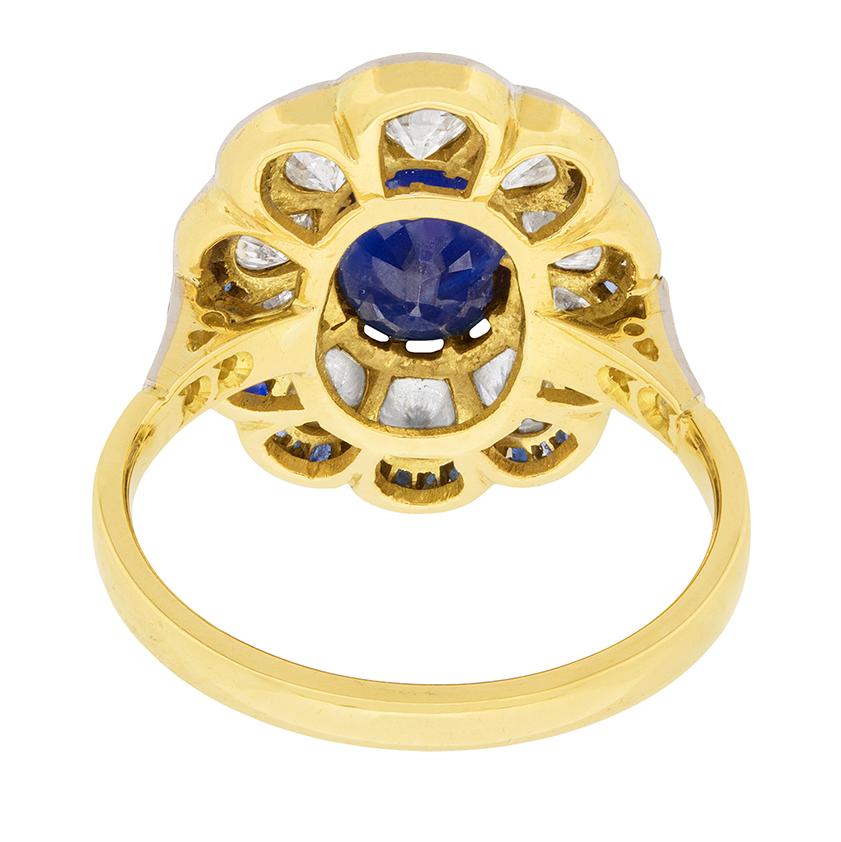 Oval Cut Late Deco Sapphire and Diamond Cluster Ring, circa 1940s