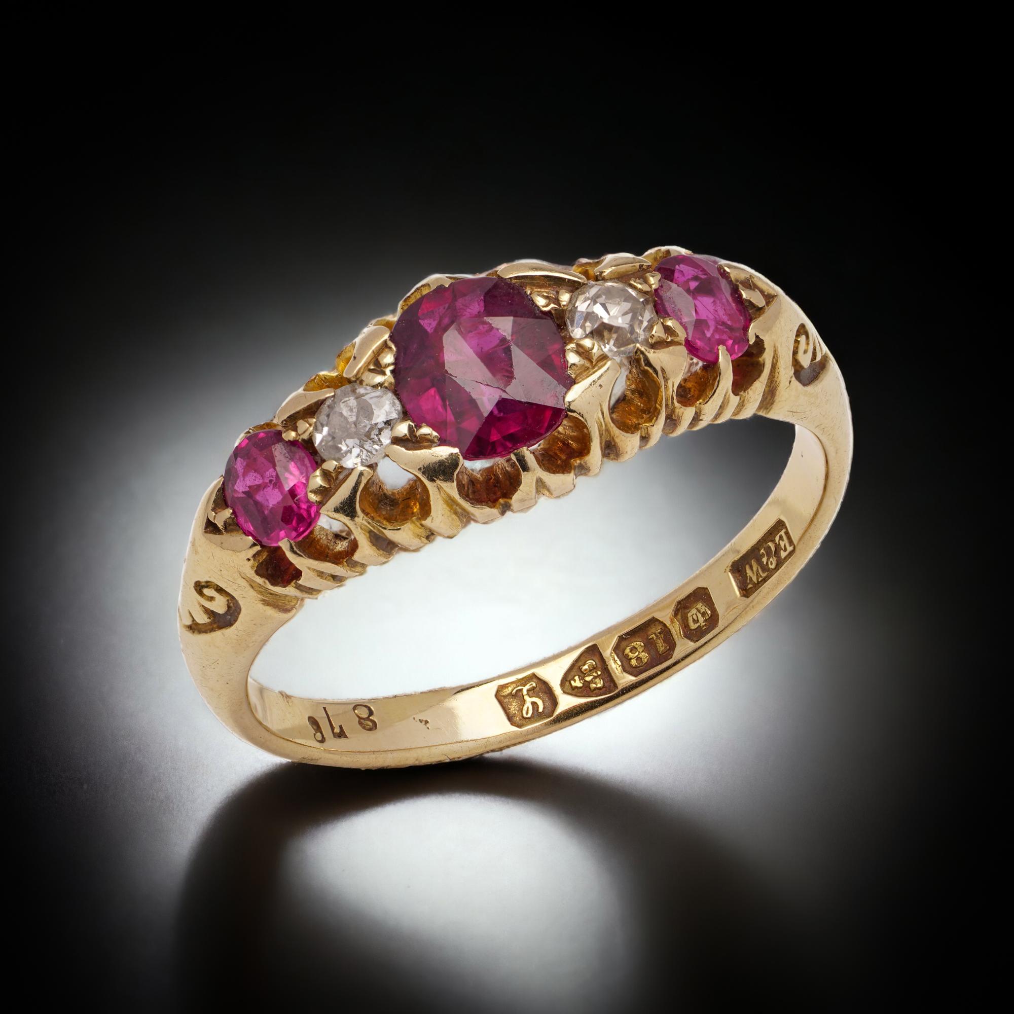 Antique Late Edwardian 18 kt. Yellow gold five-stone ruby and diamond ring. 
Made in England, Chester, 1911
Maker: Edwin Whitehouse
Fully hallmarked. 

Dimensions - 
Ring Size (UK) = O 1/2(EU) = 56.5 (US) = 7.75
Ring size: 2.7 x 2 x 0.7 cm 
Weight: