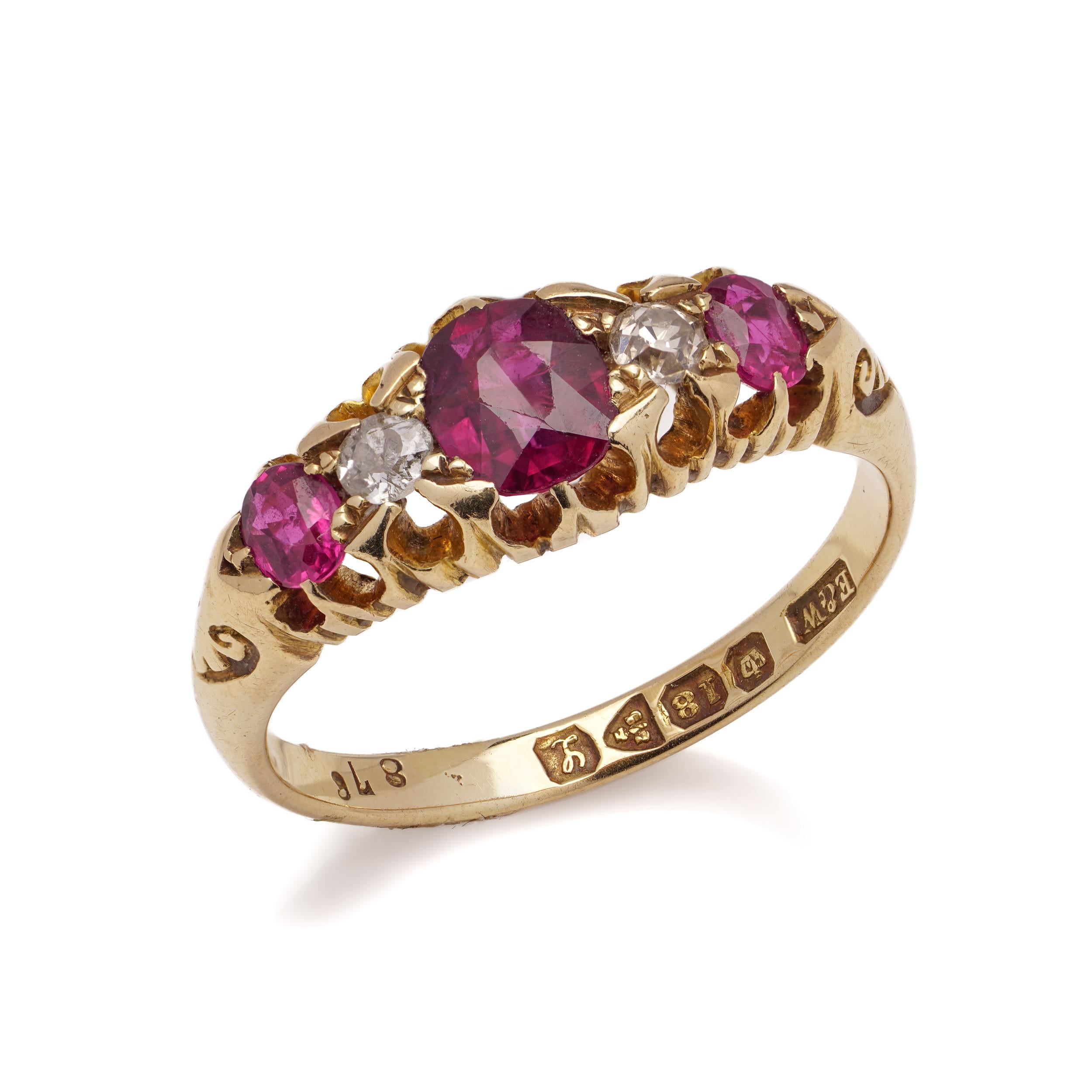 Oval Cut Late Edwardian 18 kt. Yellow gold five-stone ruby and diamond ring For Sale