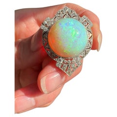 Late Edwardian Black, Starr and Frost Opal and Diamond Pendant Brooch
