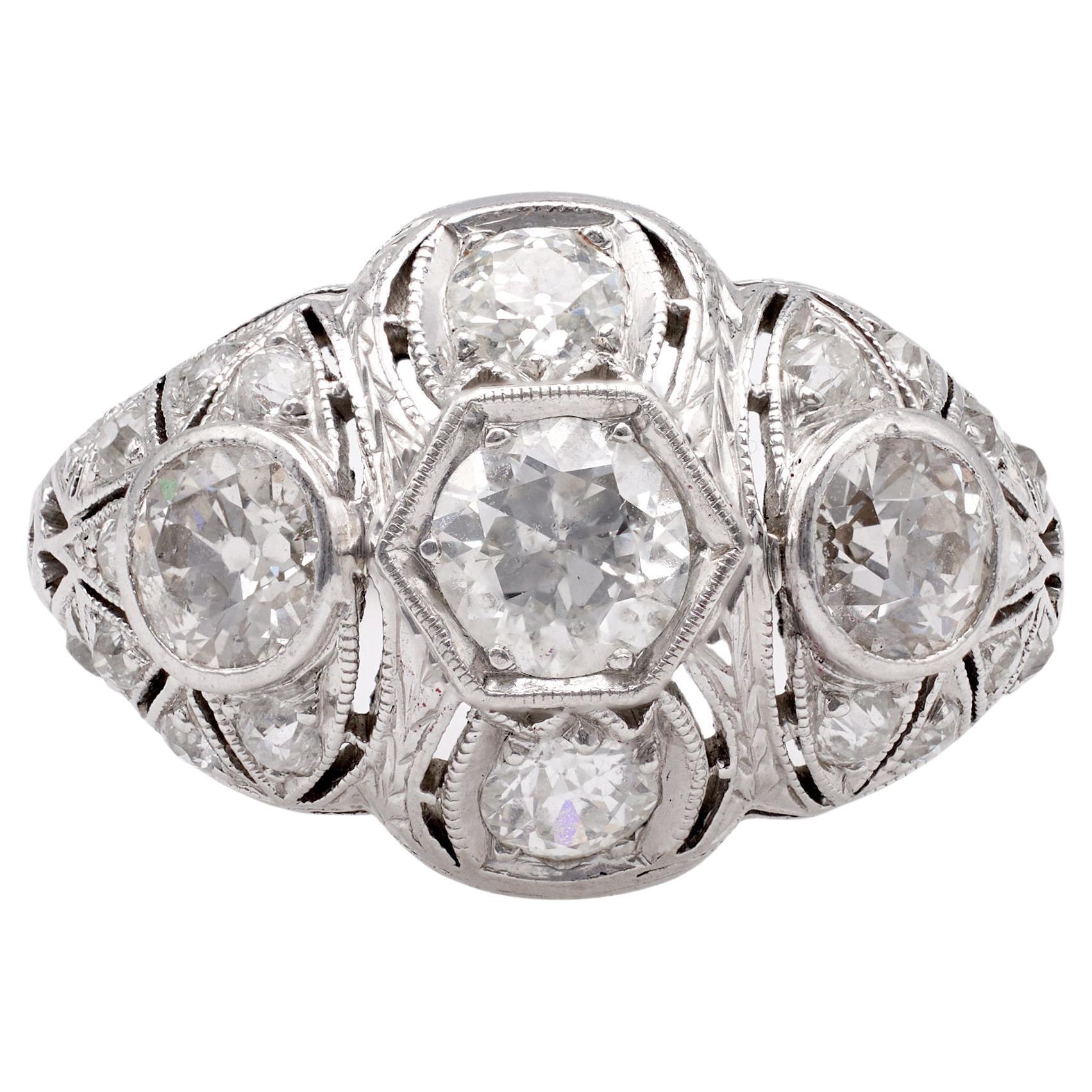 Late Edwardian Diamond Platinum Three Stone Filigree Ring