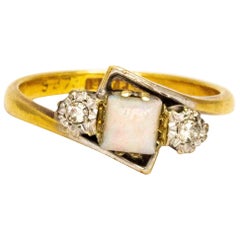 Late Edwardian Opal and Diamond 18 Carat Gold Three-Stone Ring