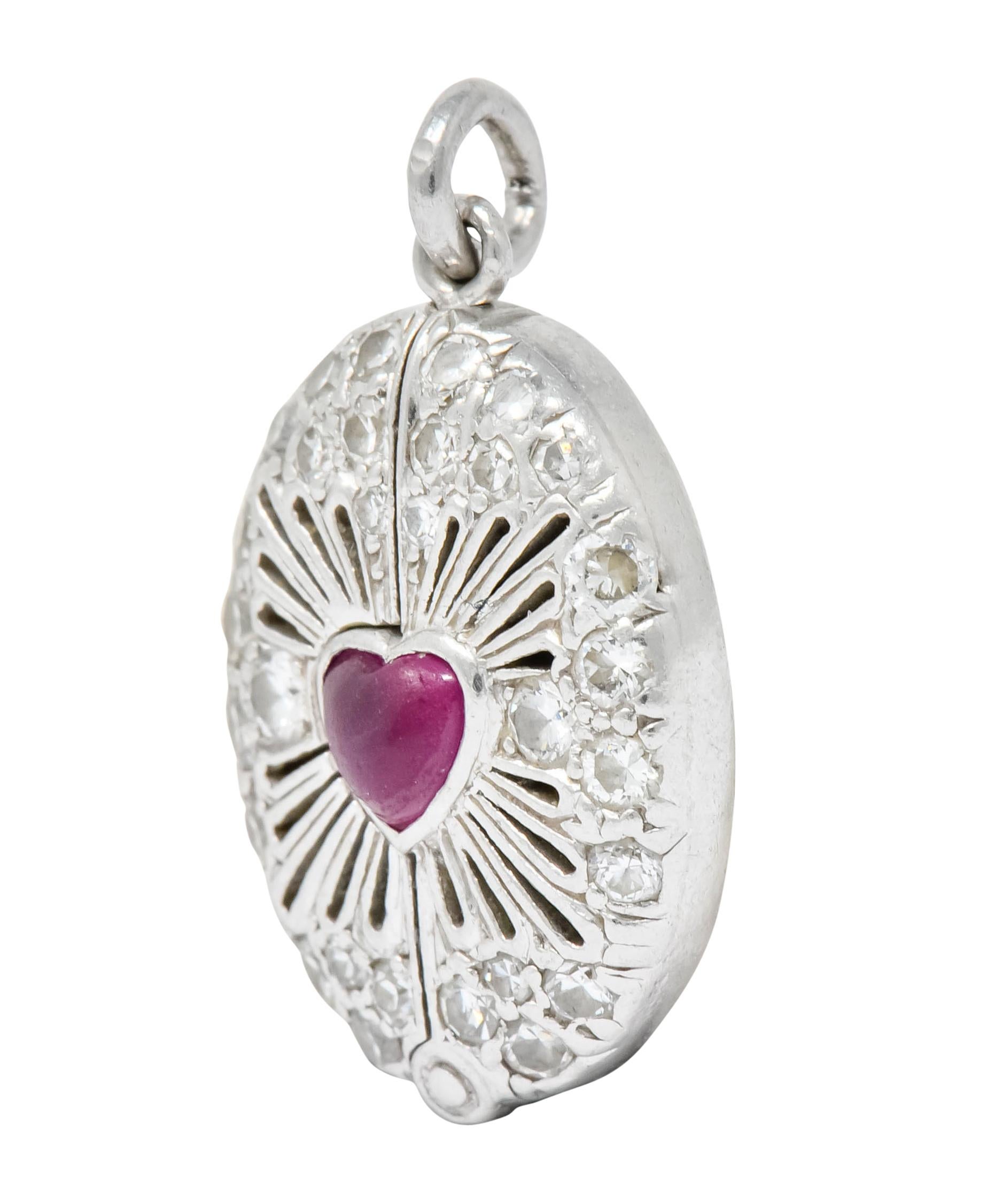 Late Edwardian Ruby Diamond Platinum Sacred Heart Cross Articulated Charm In Excellent Condition In Philadelphia, PA