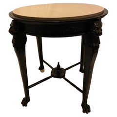 Late English regency stone topped table in the Egyptianate style