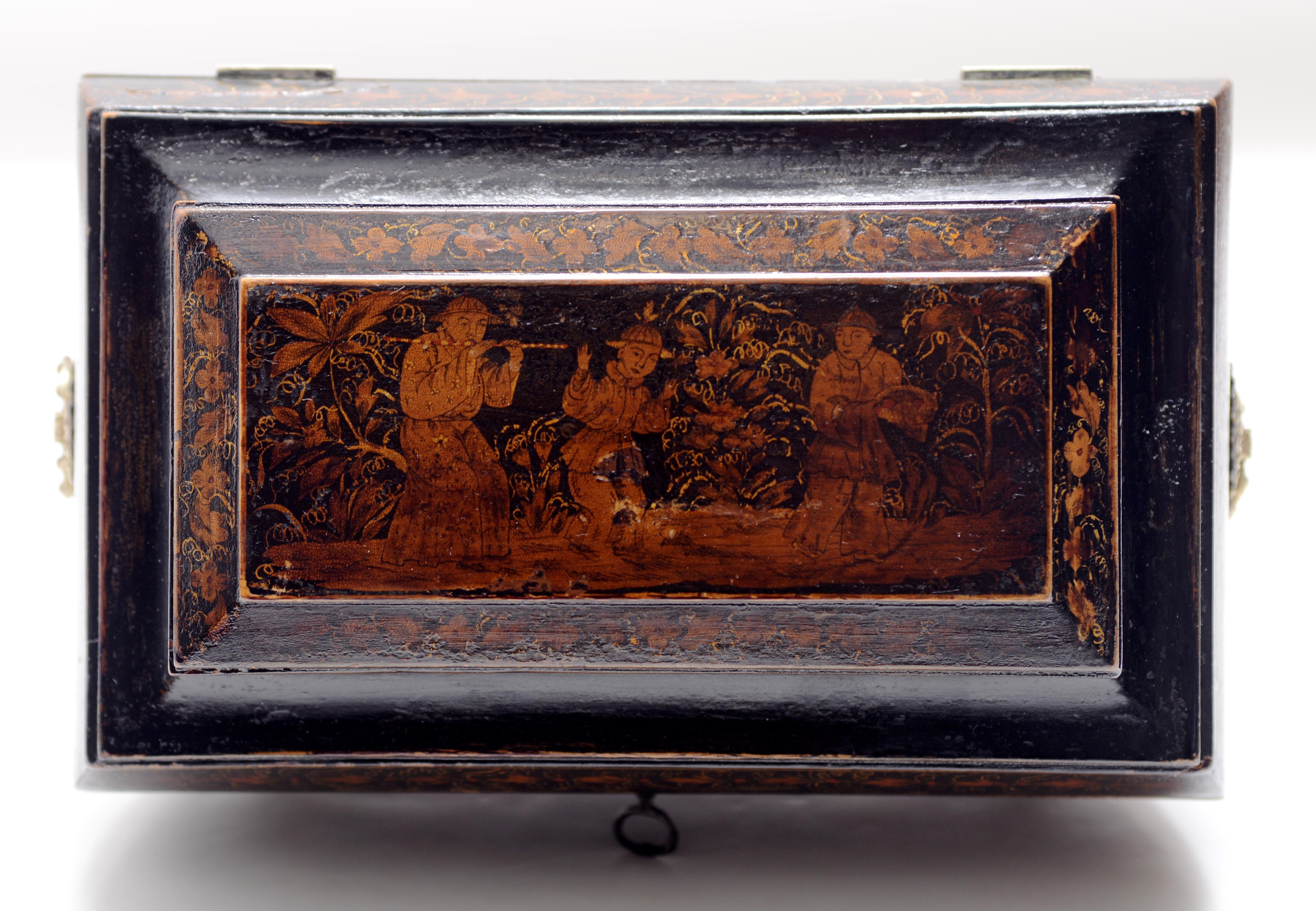 Late Geo III Bombé Shaped Chinoiserie Painted and Penwork Decorated Tea Caddy, C1810. The tea caddy with the exterior covered in delicate penwork and painted designs of Chinoiserie images, exotic birds and flowers. The two interior compartments with