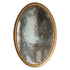 Late George III Giltwood Oval Mirror, c.1790