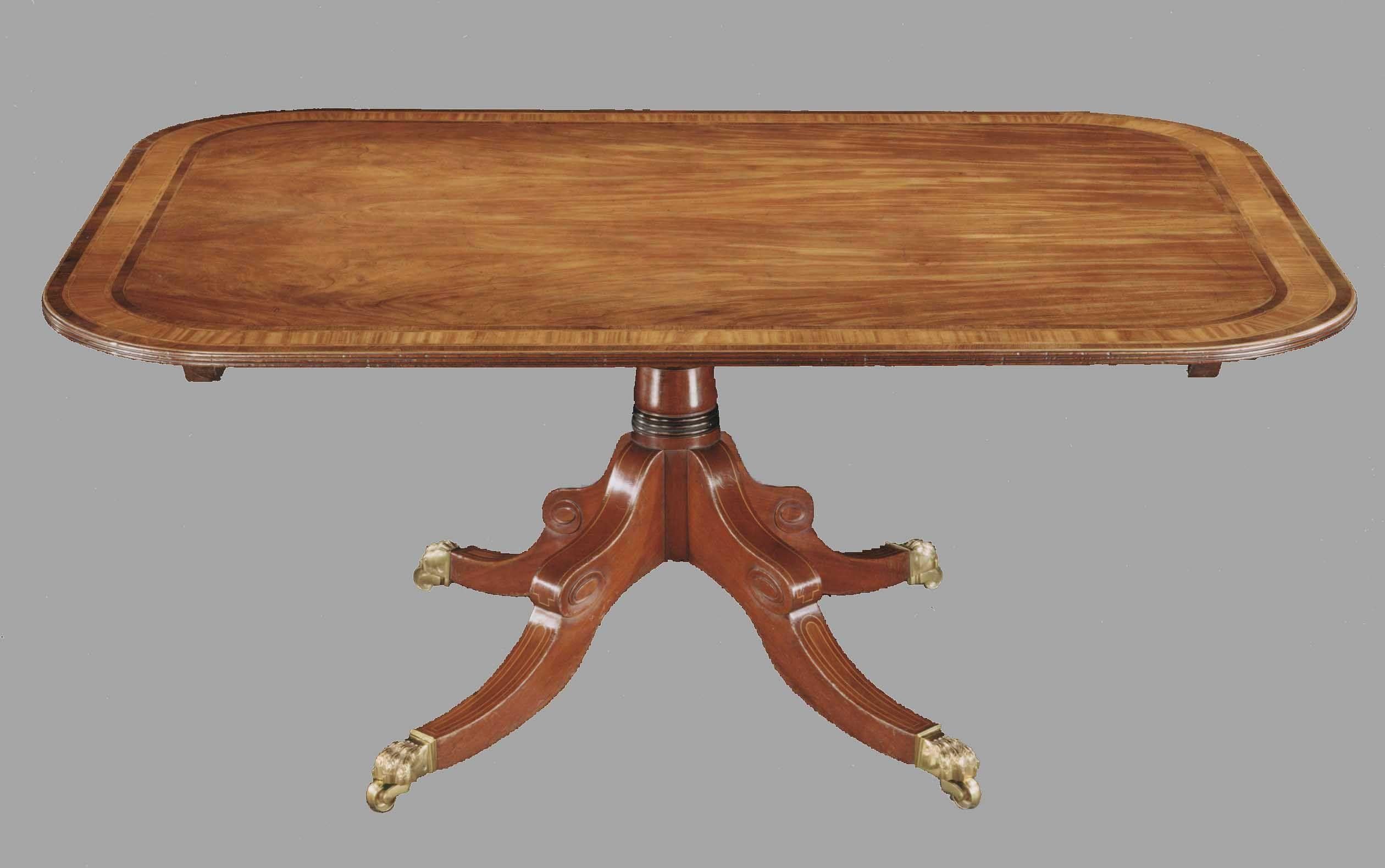Late George III mahogany and satinwood inlaid centre pedestal dining table.