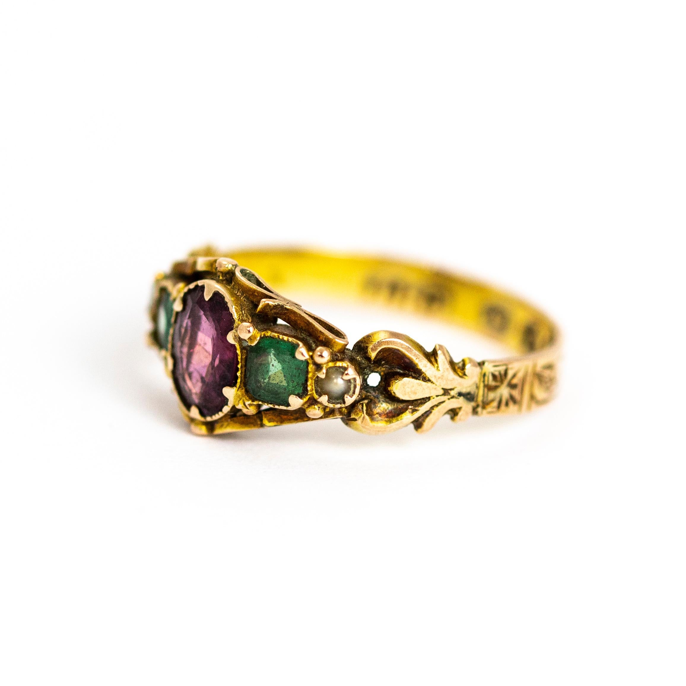 Lovely Late Georgian 12ct gold multi-stone ring of pearls, Emeralds and Amethyst. The band itself is so decorative, the shoulders have a double scroll detail and all the way around is delicate scroll engraving. Made in Birmingham, England.

Ring