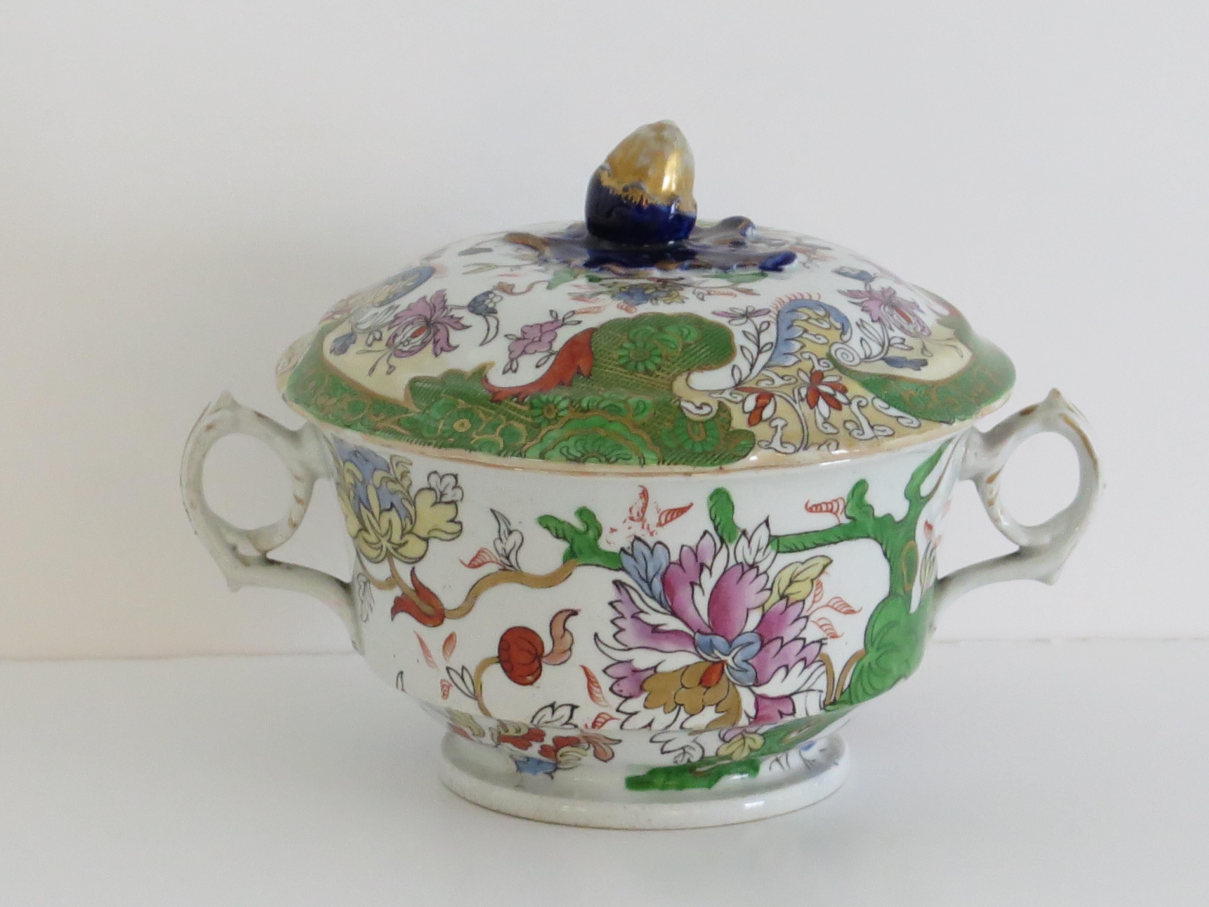 This is a very decorative Ironstone Sauce Tureen, complete with lid , made by Mason's of Lane Delph, Staffordshire, England, during the late Georgian period of the early part of the 19th century, circa 1830.

This tureen is well potted with a