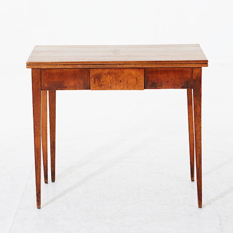 Lovely Late Gustavian mahogany game table, circa 1800. Has patina and imperfections that add to its charm but can be refinished if requested. The top of the table can expand or be removed.