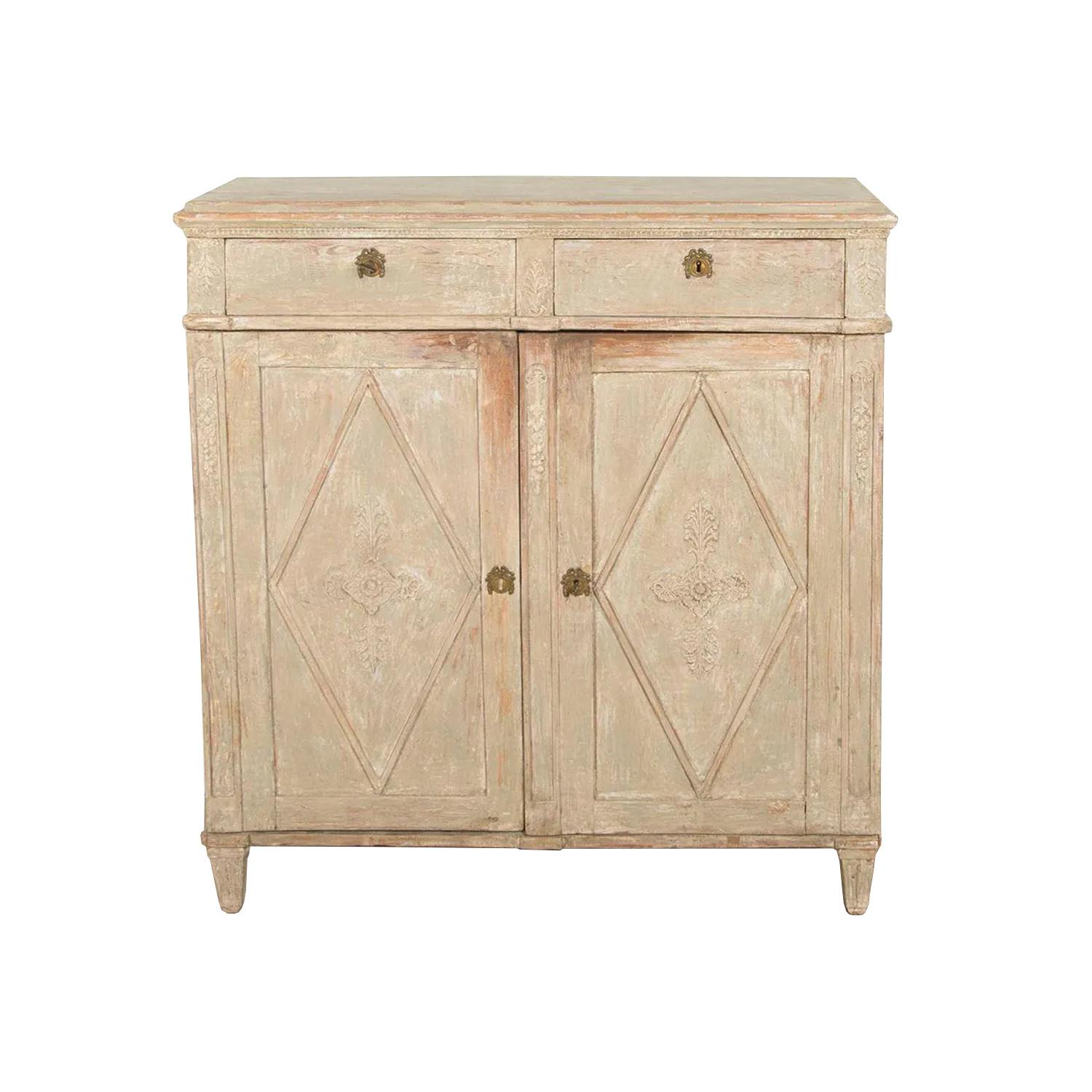 A fine late Gustavian sideboard made in the beginning of the 19th century. Small repairs on the original plaster decorations. Original paint inside. Later made feet. This piece has been repainted.
 