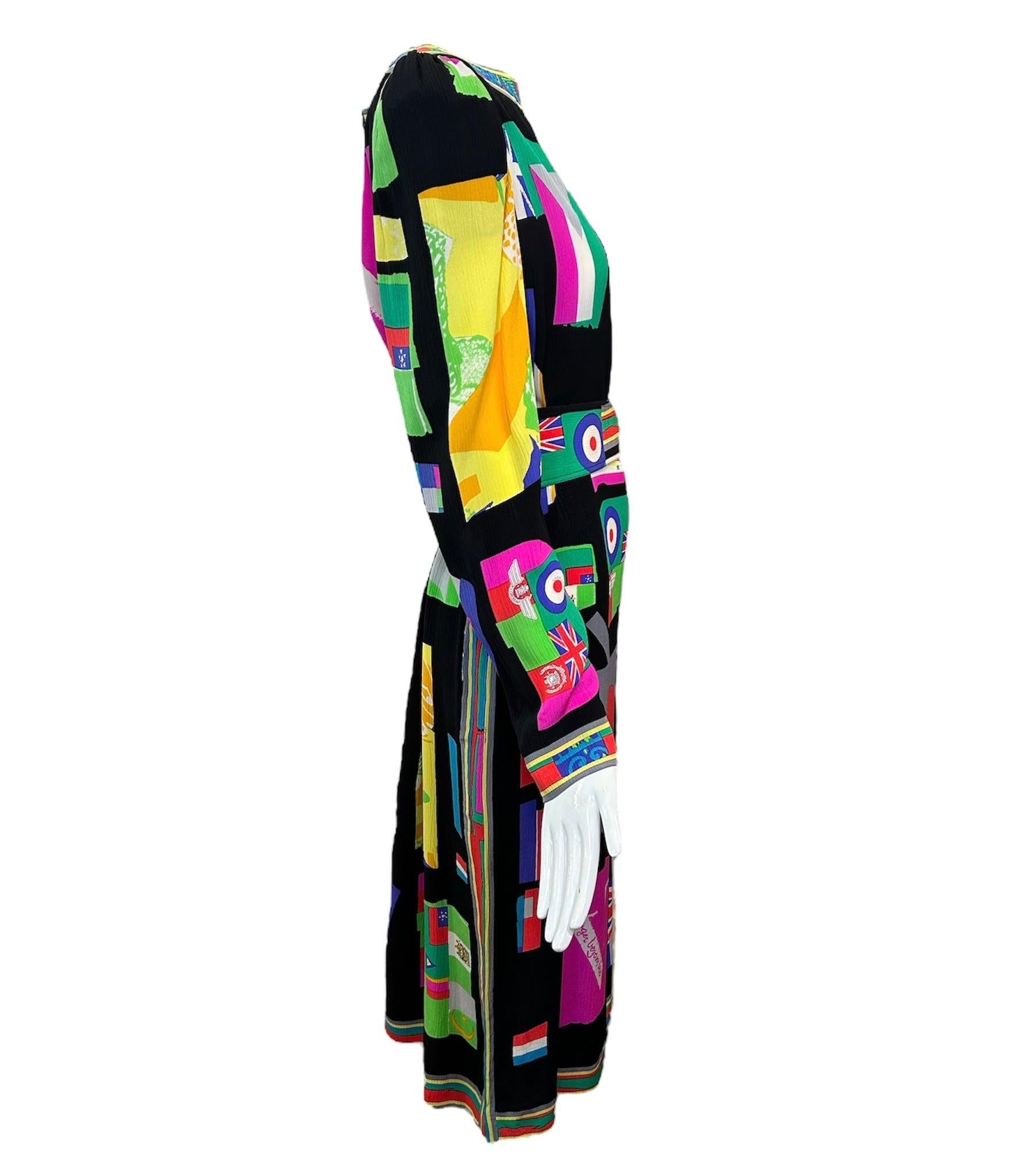 One of the more unique LEONARD pieces we've showcased. This piece features flags and emblems from all over the world in a neon collage of color! Boat neck and matching belt, this piece is complete to turn heads with its colorful yet classy flair.