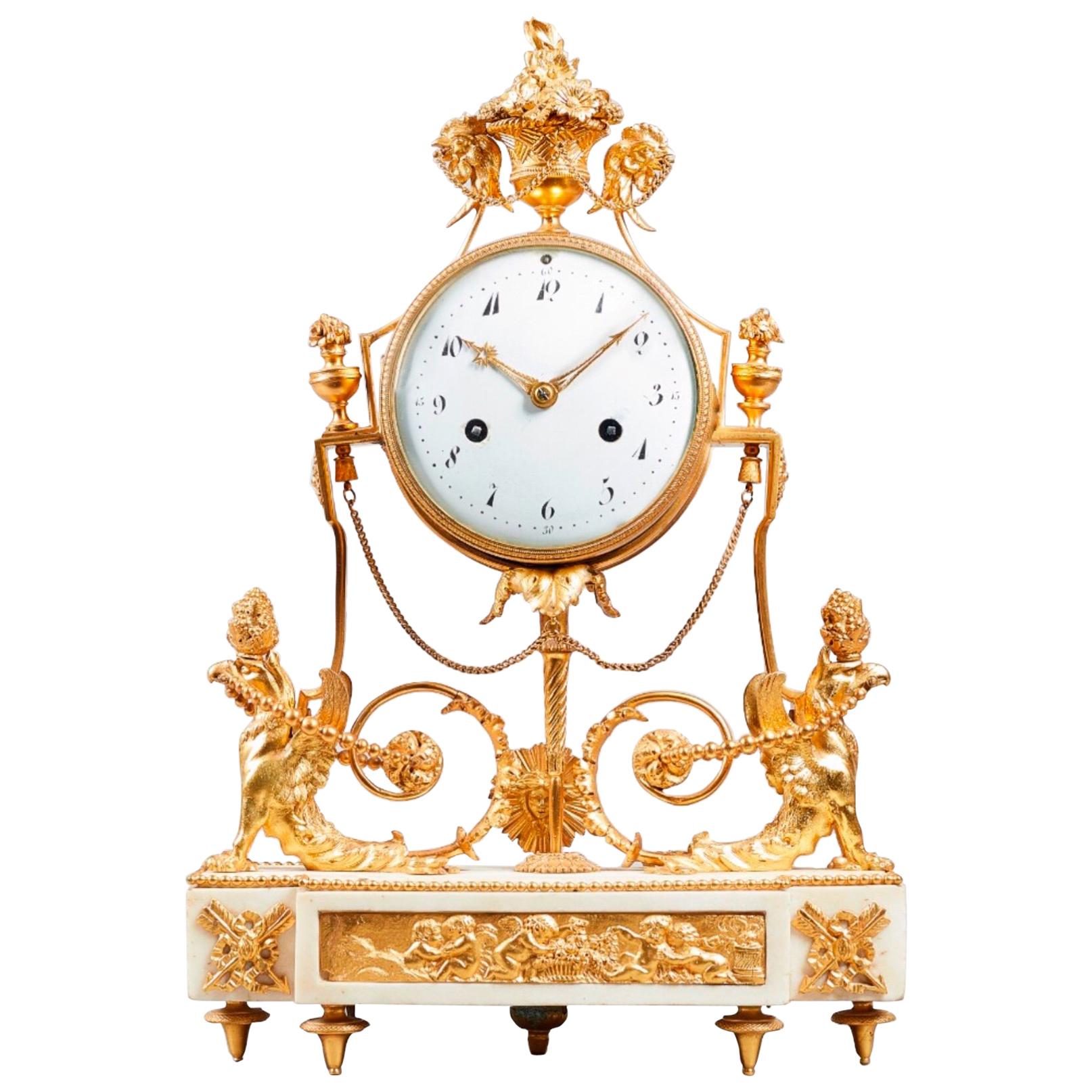 19th Century Late Louis XVI Ormolu and White Marble Striking Mantel Clock