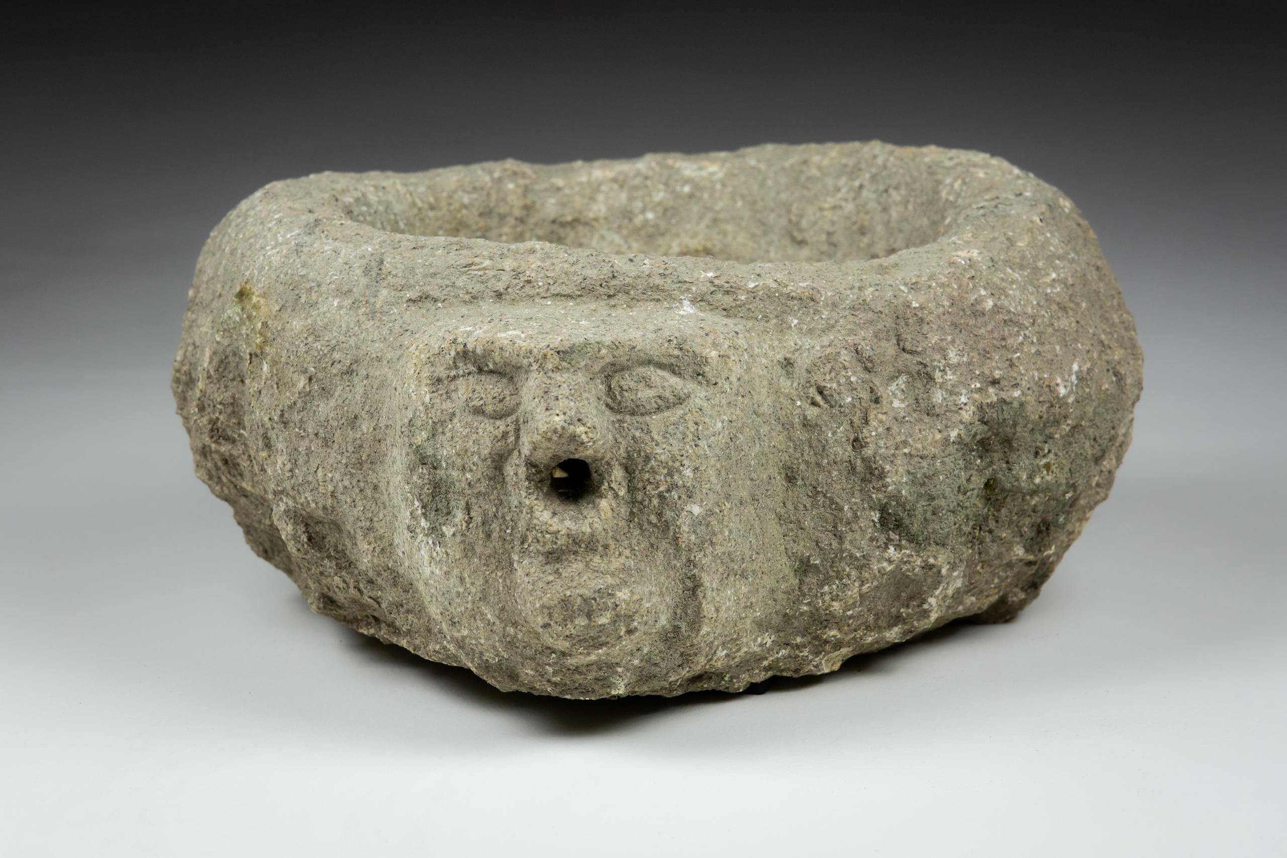 Late Medieval Granite Benitier or Stoup with Primitive Head as the Water Spout In Distressed Condition For Sale In Pease pottage, West Sussex