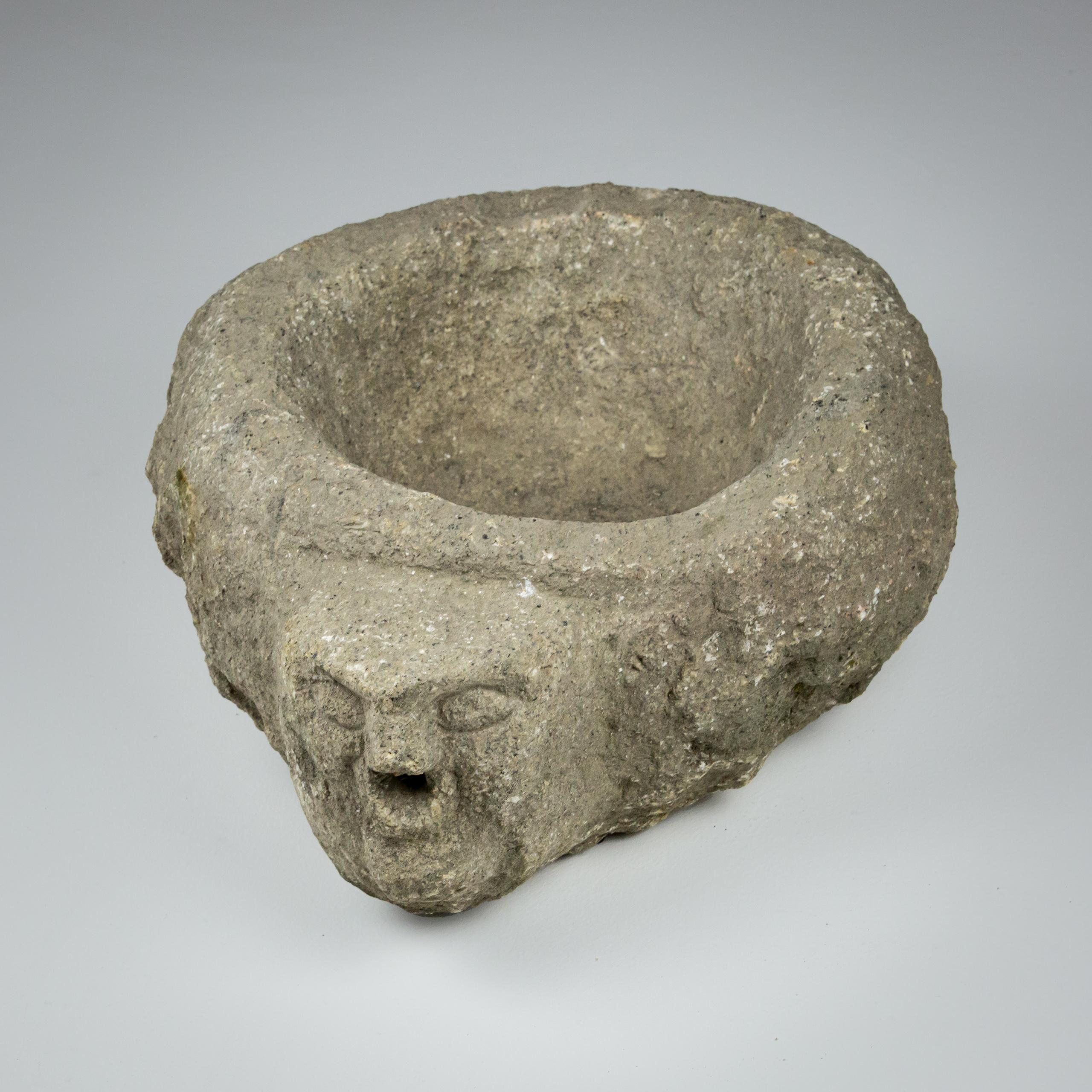18th Century and Earlier Late Medieval Granite Benitier or Stoup with Primitive Head as the Water Spout For Sale