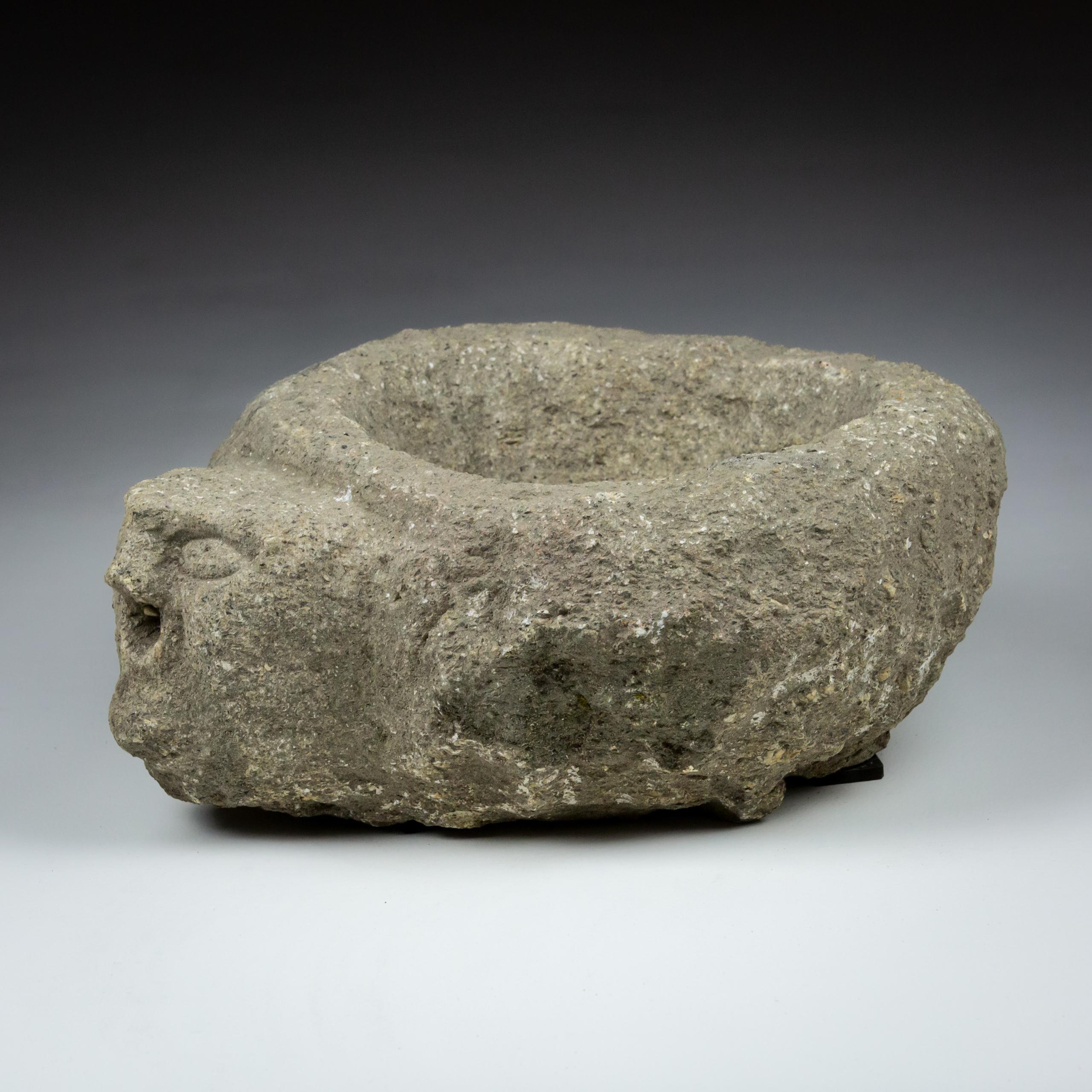 Stone Late Medieval Granite Benitier or Stoup with Primitive Head as the Water Spout For Sale